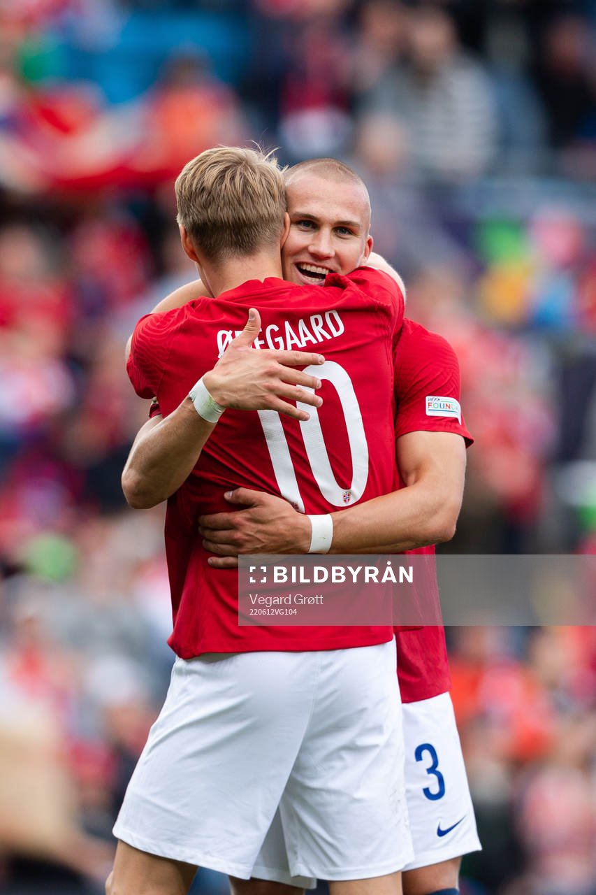 Martin Ødegaard and Leo Østigård of Norway celebrate during the Nations League football match between Norway and Sweden on June 12, 2022 in Oslo. 