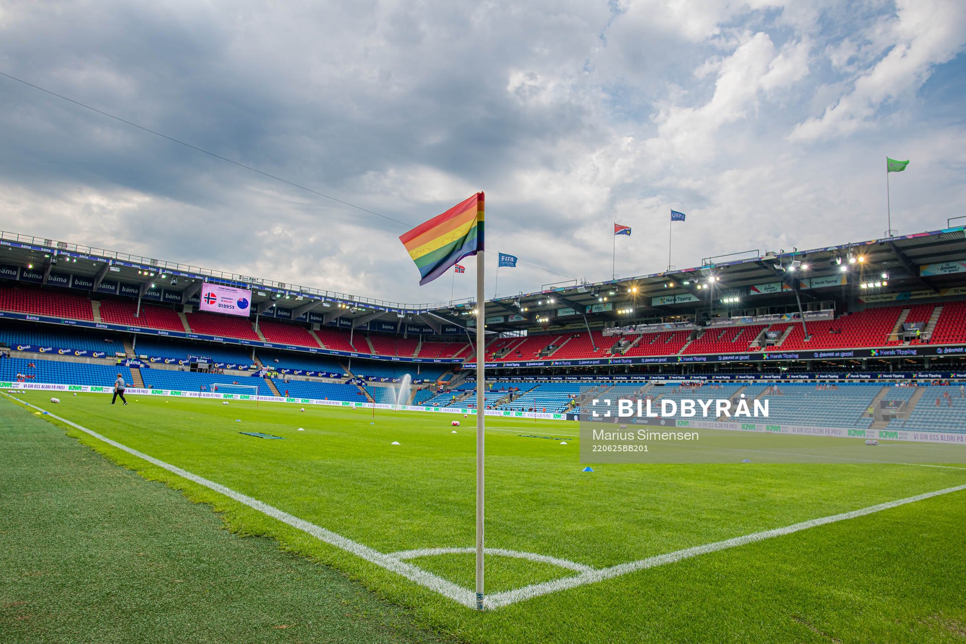 A rainbow-colored corner flag at Ullevaal Stadion