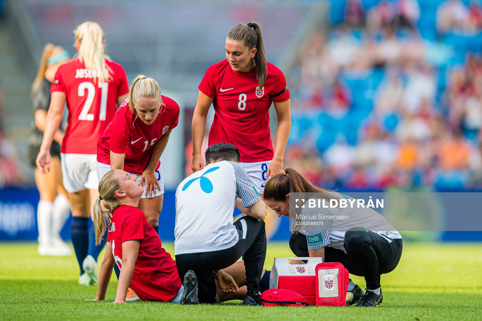Lisa Fjeldstad Naalsund of Norway leaves the pitch with an