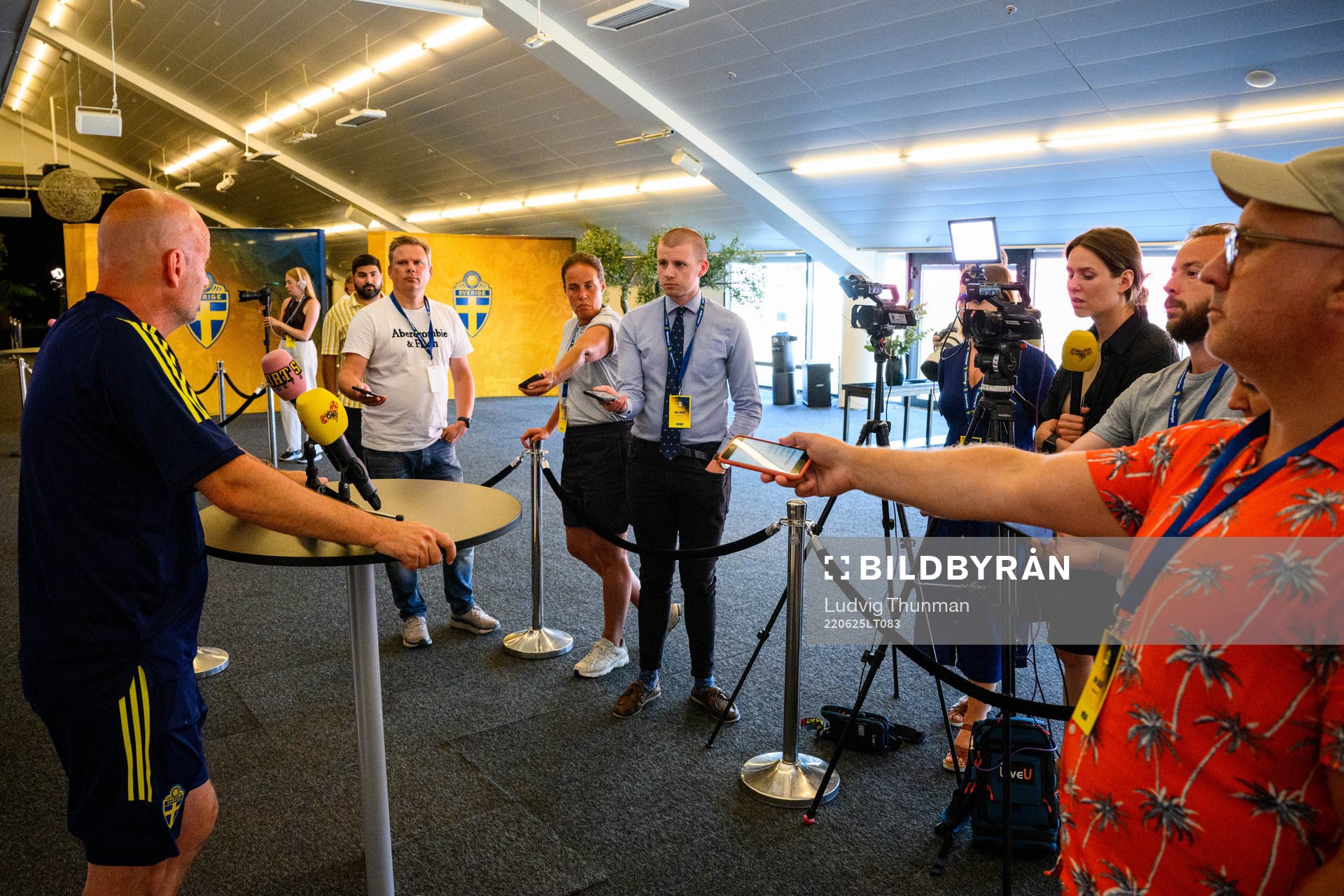 Magnus Wikman, assistant coach is interviewed by the media