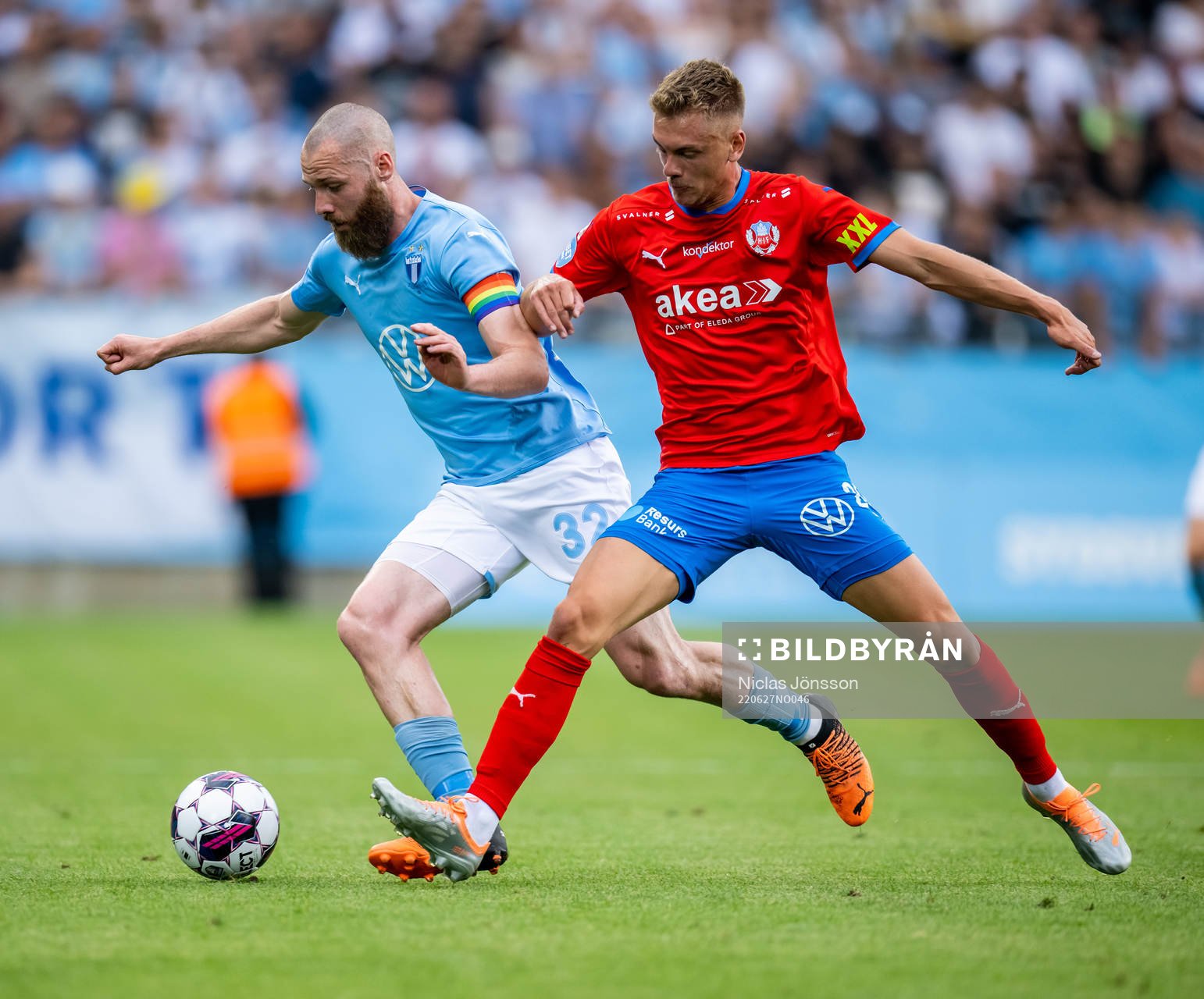 Malmö FFs Jo Inge Berget och Helsingborgs Dennis Olsson