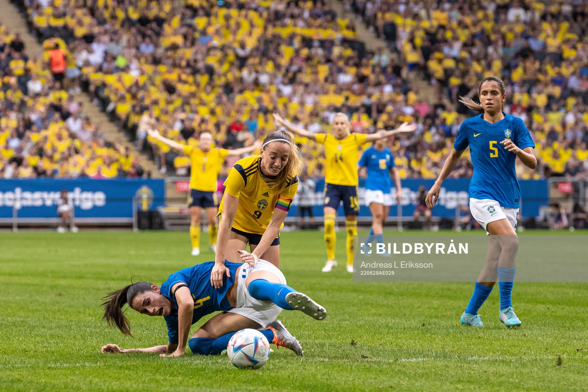 Rafaelle of Brazil and Kosovare Asllani of Sweden