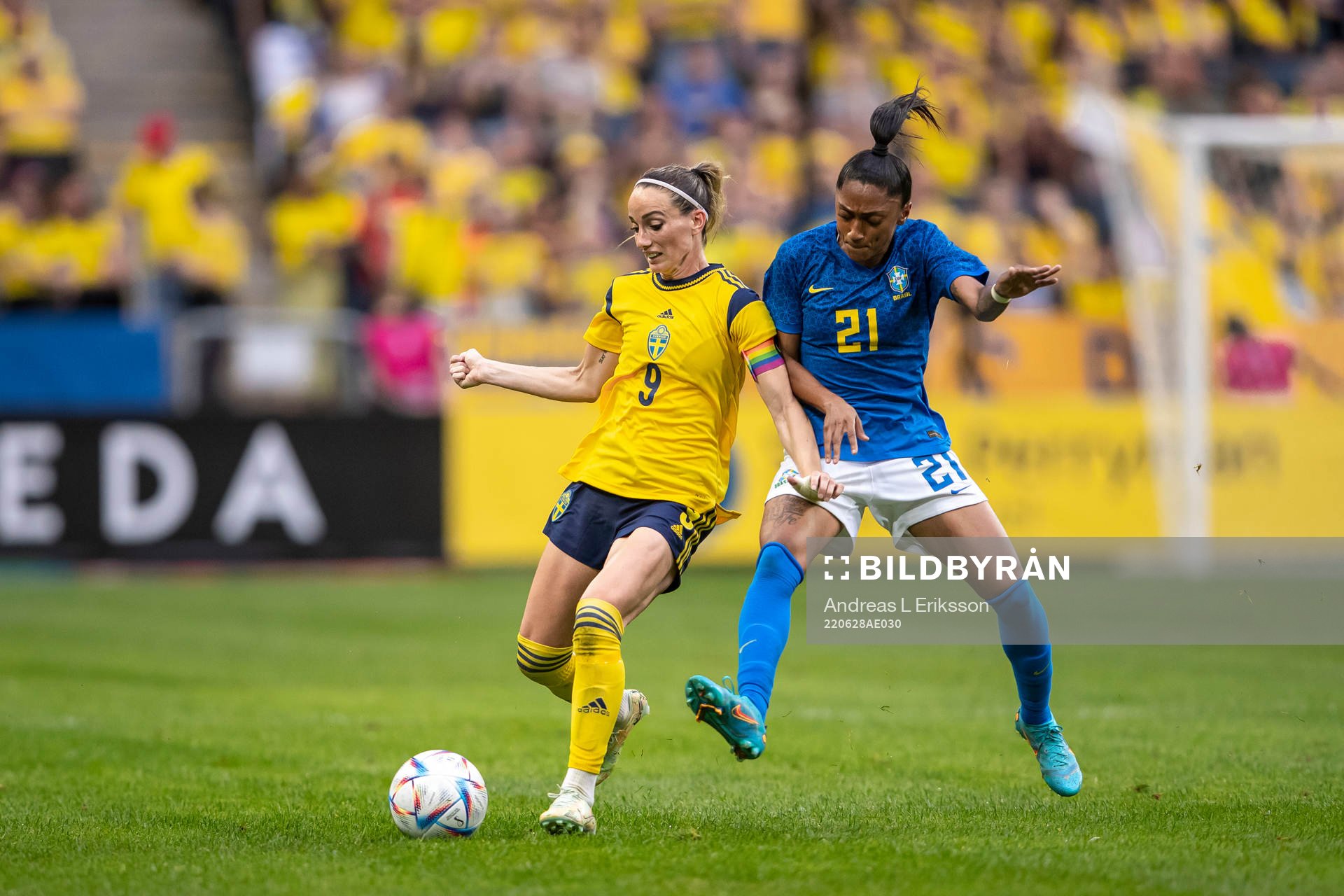 Kosovare Asllani of Sweden and Kerolin of Brazil
