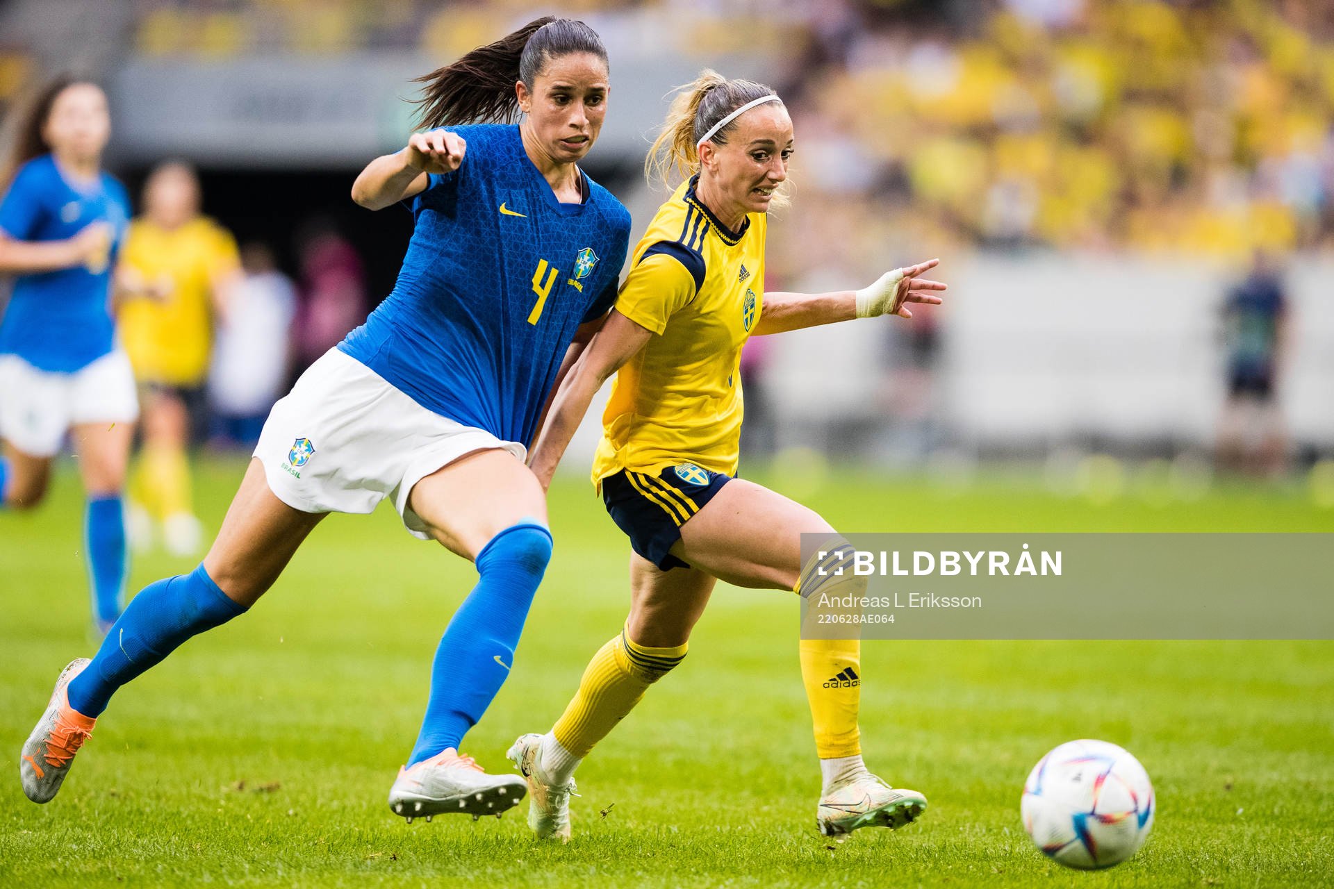 Rafaelle of Brazil and Kosovare Asllani of Sweden