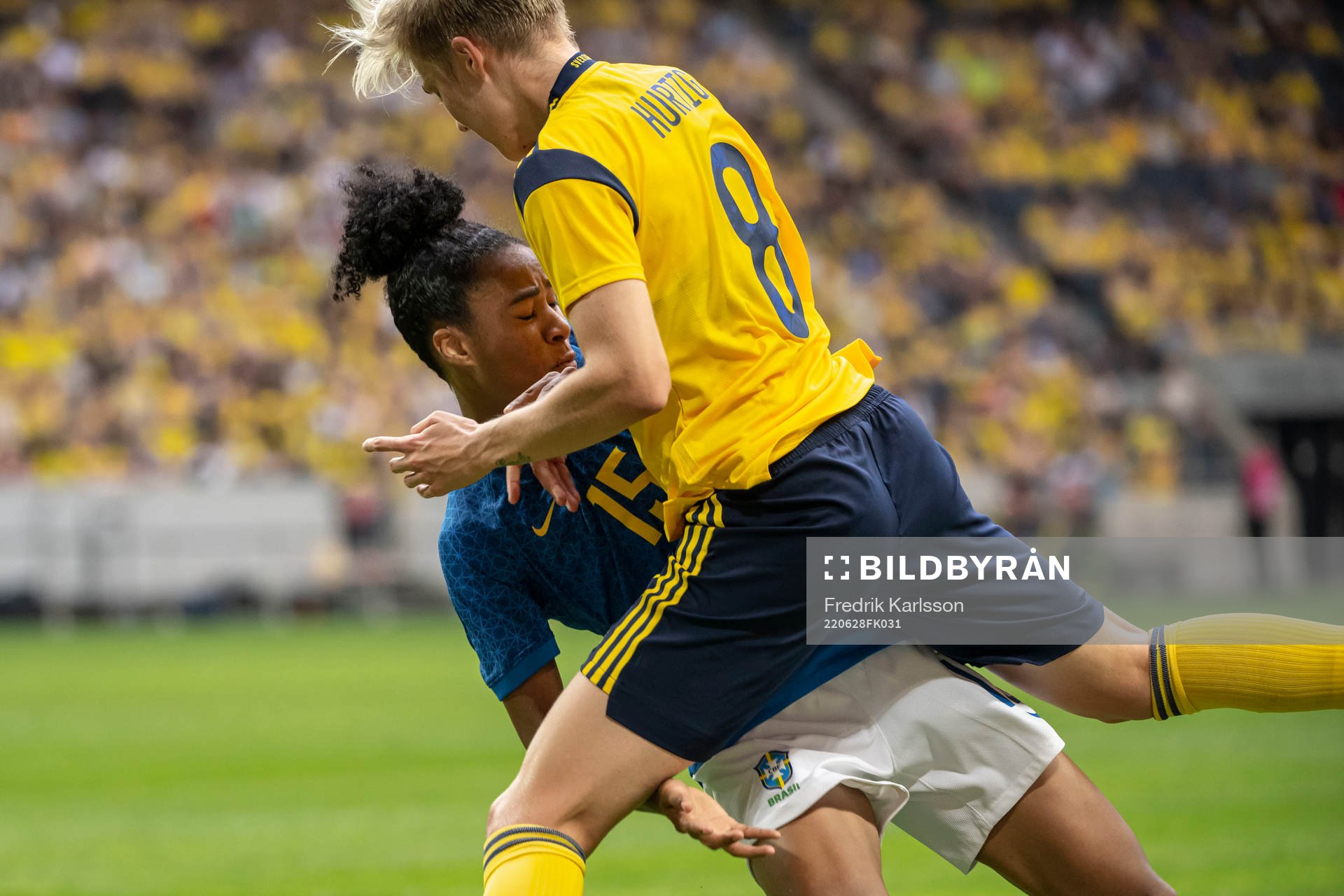 Tainara of Brazil and Lina Hurtig of Sweden collides