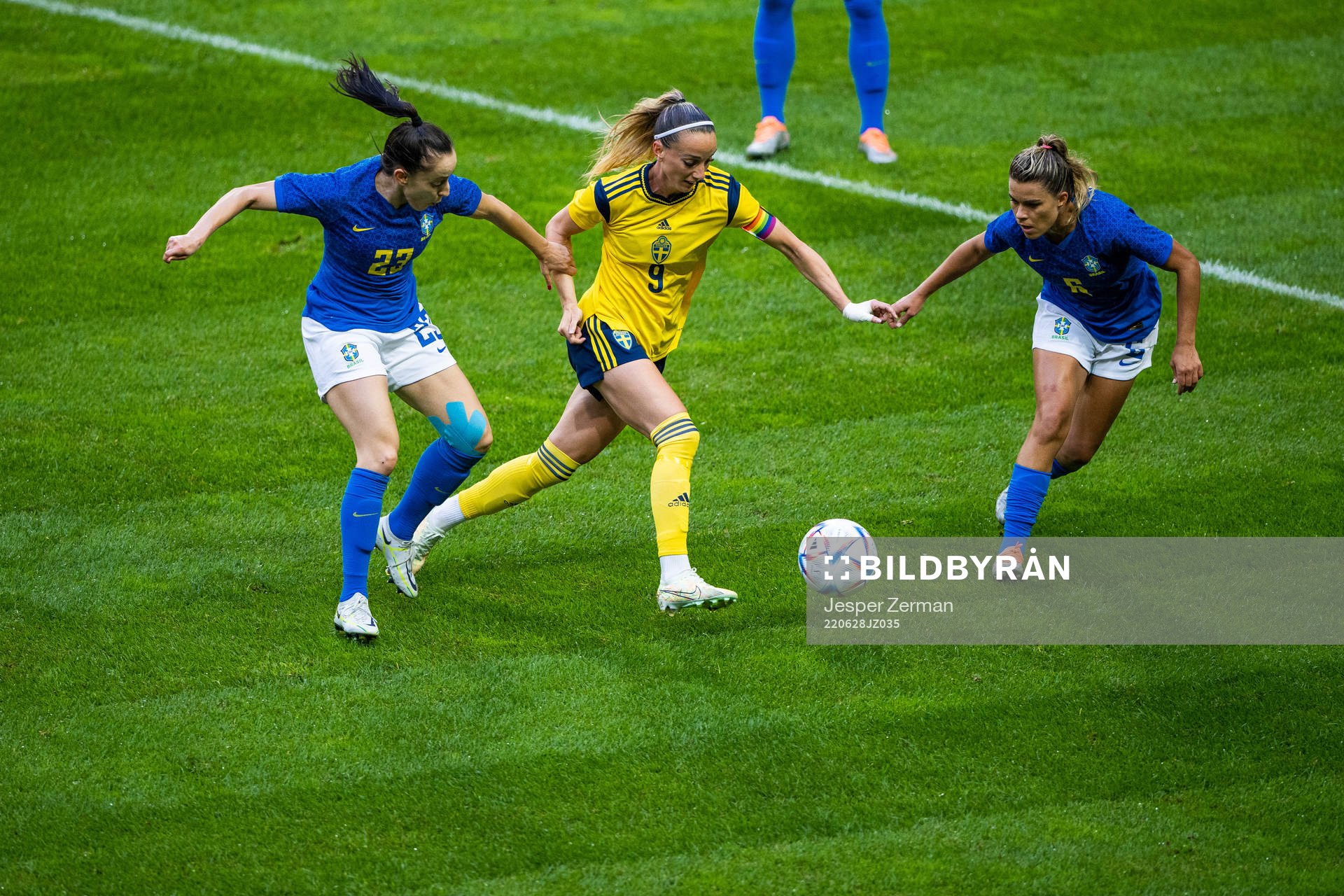 Luana and Tamires of Brazil compete for the ball with