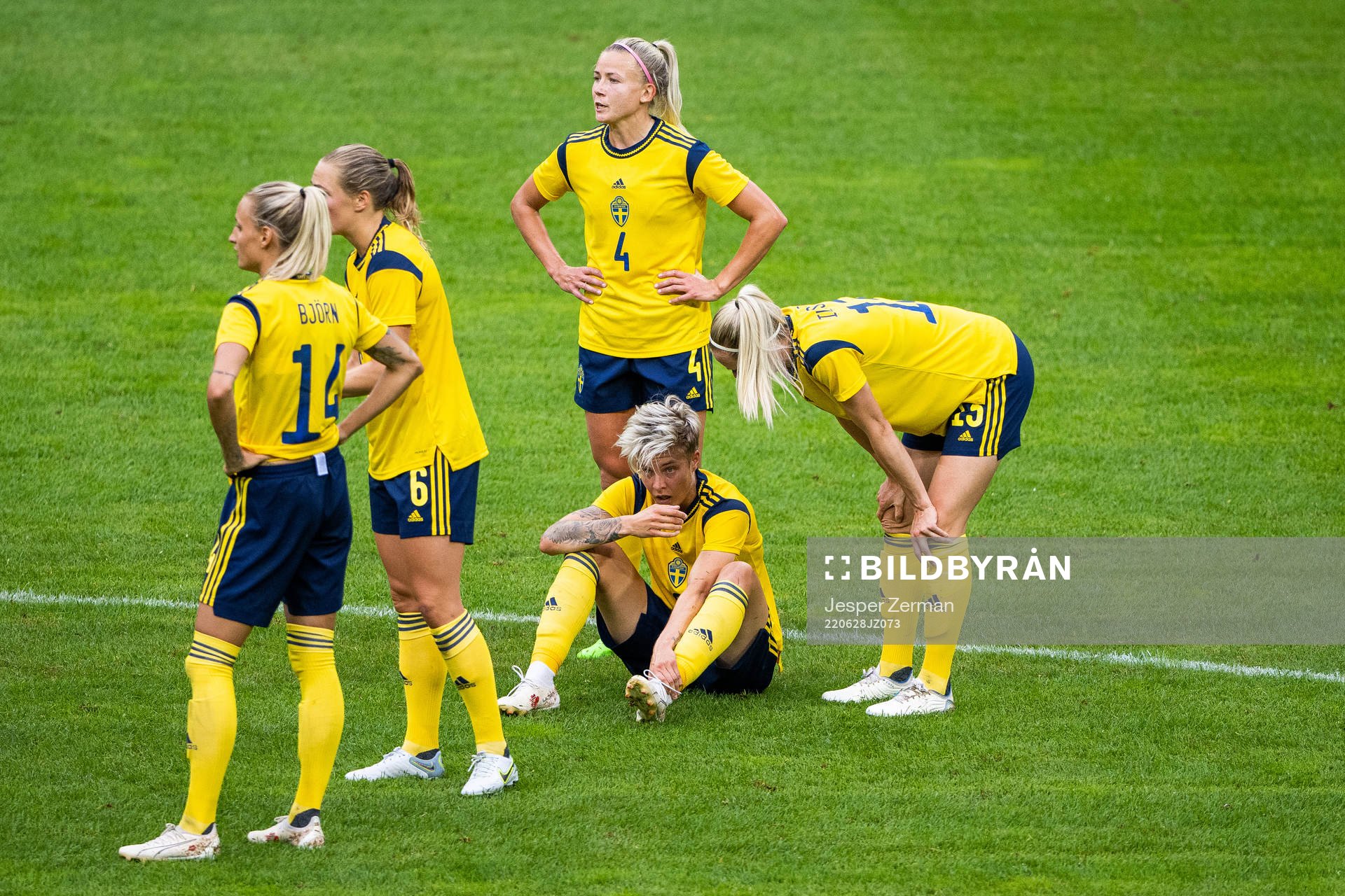 Lina Hurtig of Sweden in pain sitting down