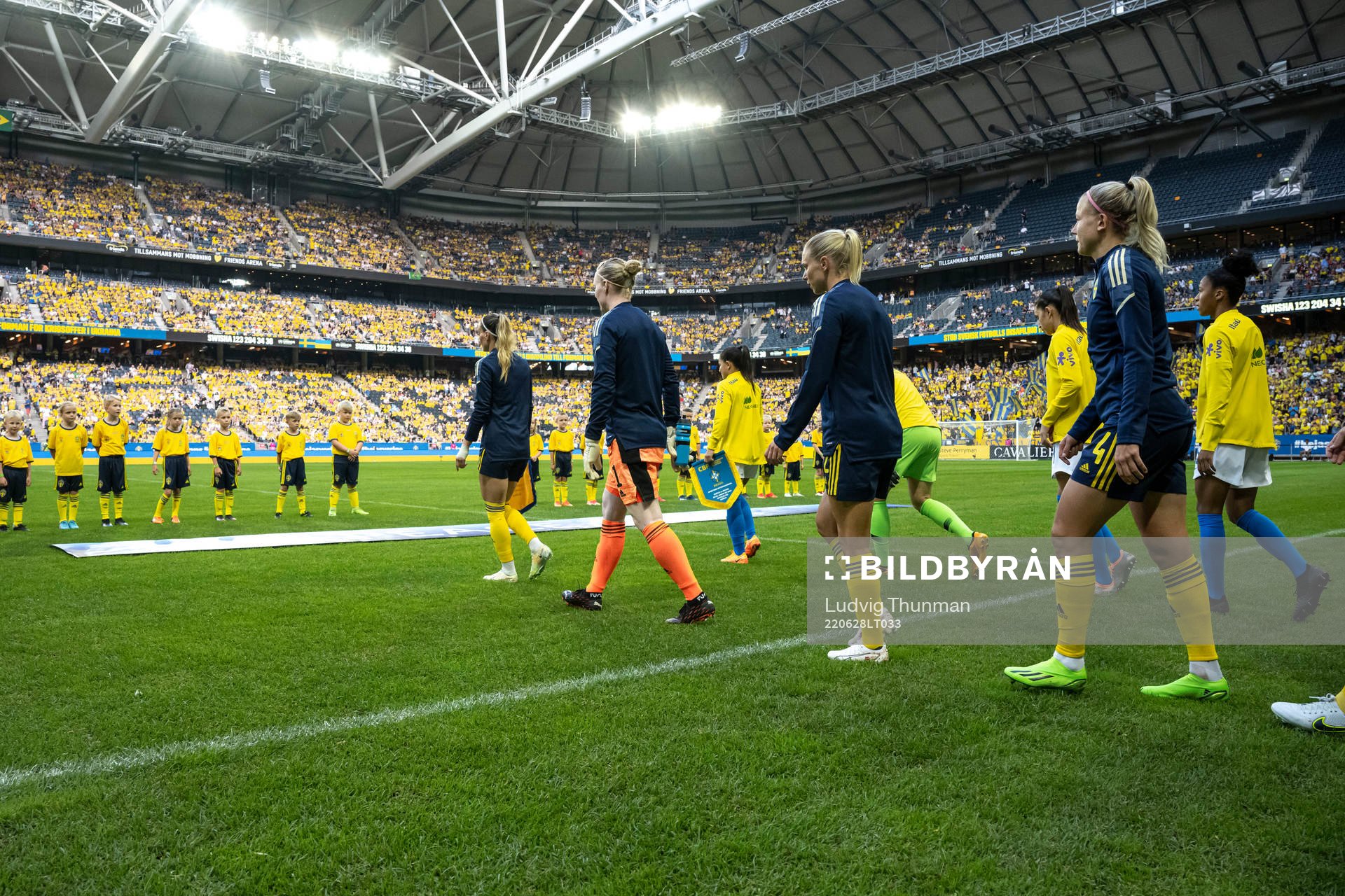 Players of Sweden enter the pitch