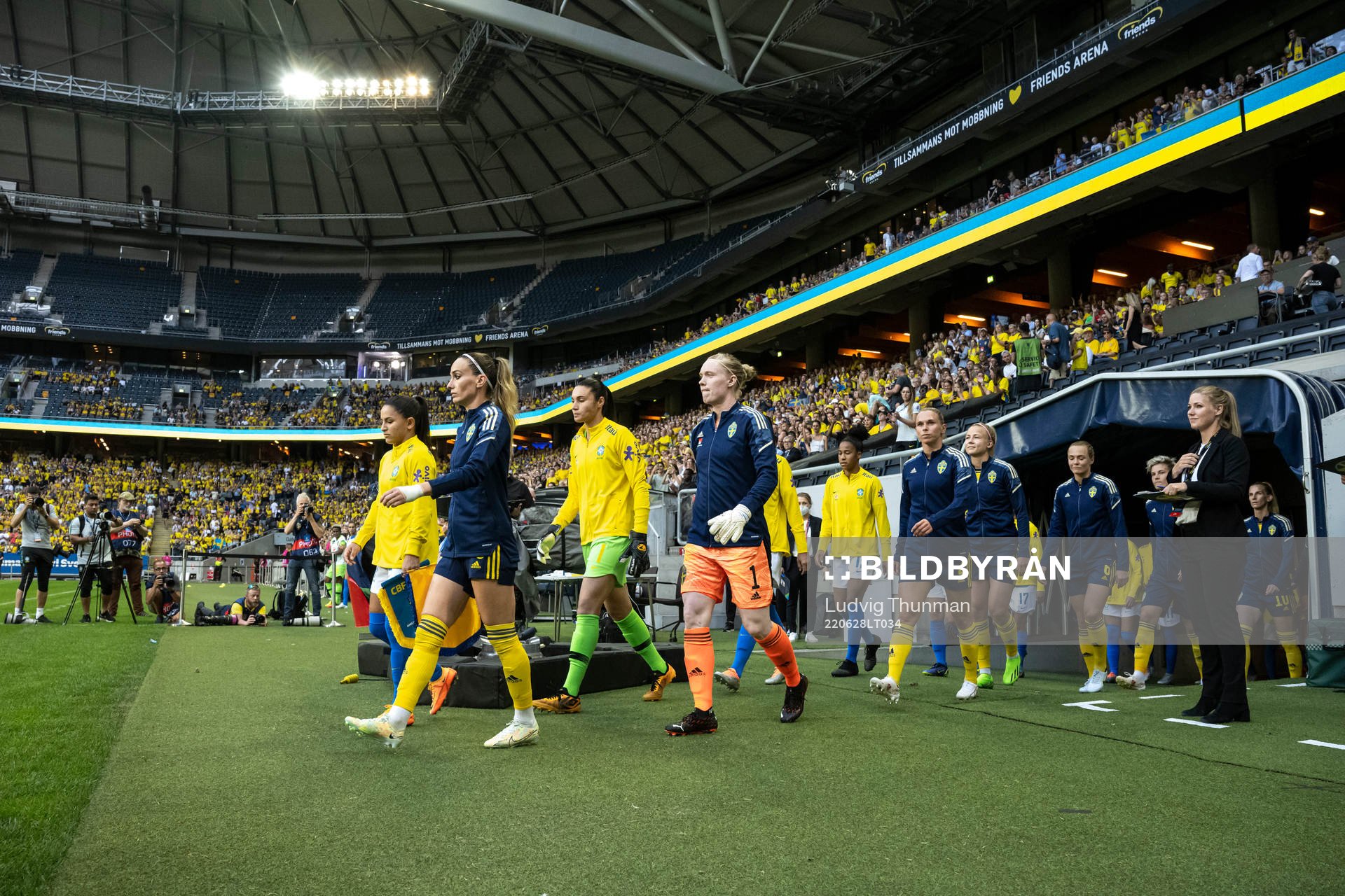 Players of Sweden enter the pitch