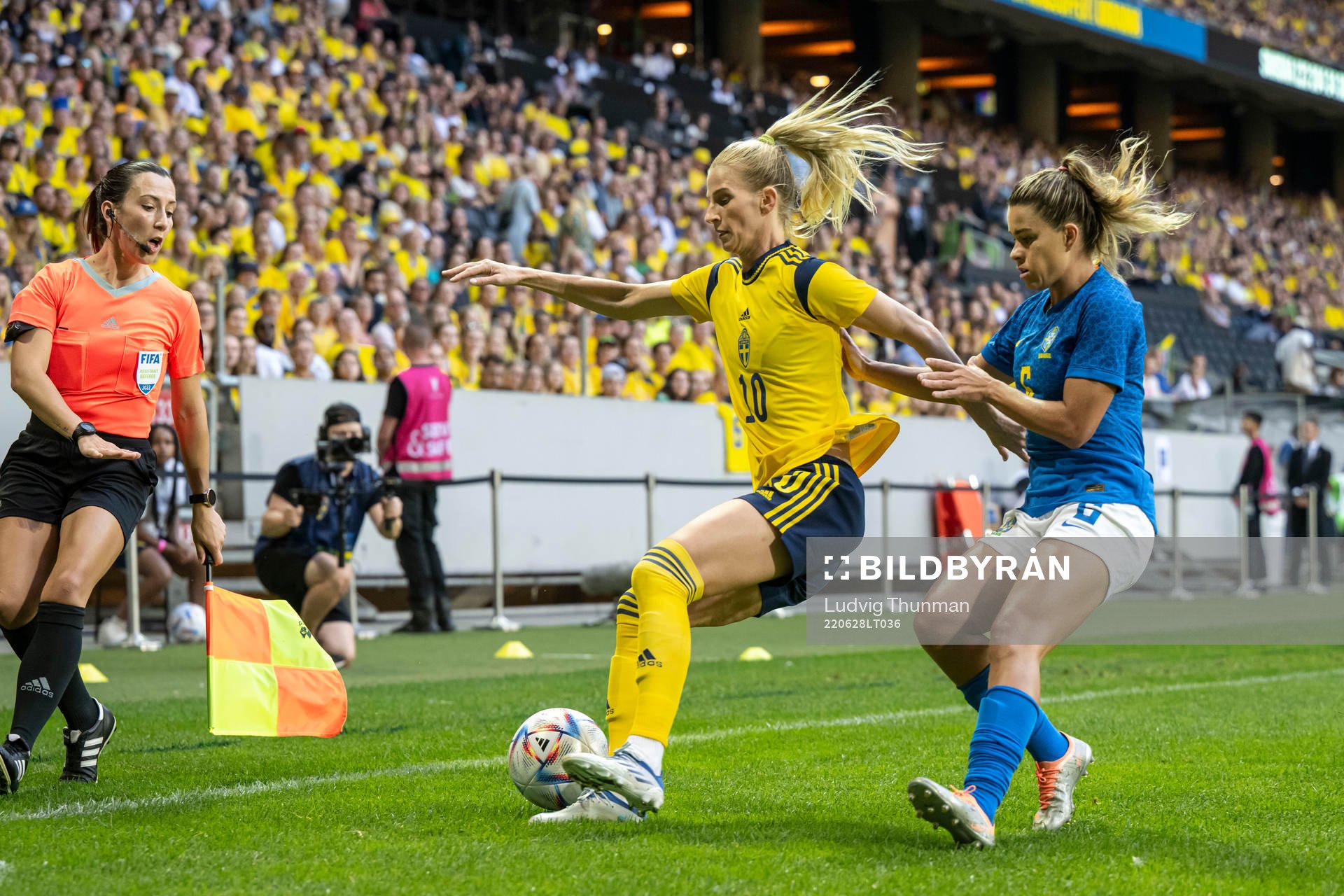 Sofia Jakobsson of Sweden and Tamires of Brazil during the women's international friendly football match between Sweden and Brazil on June 28, 2022 in Stockholm.