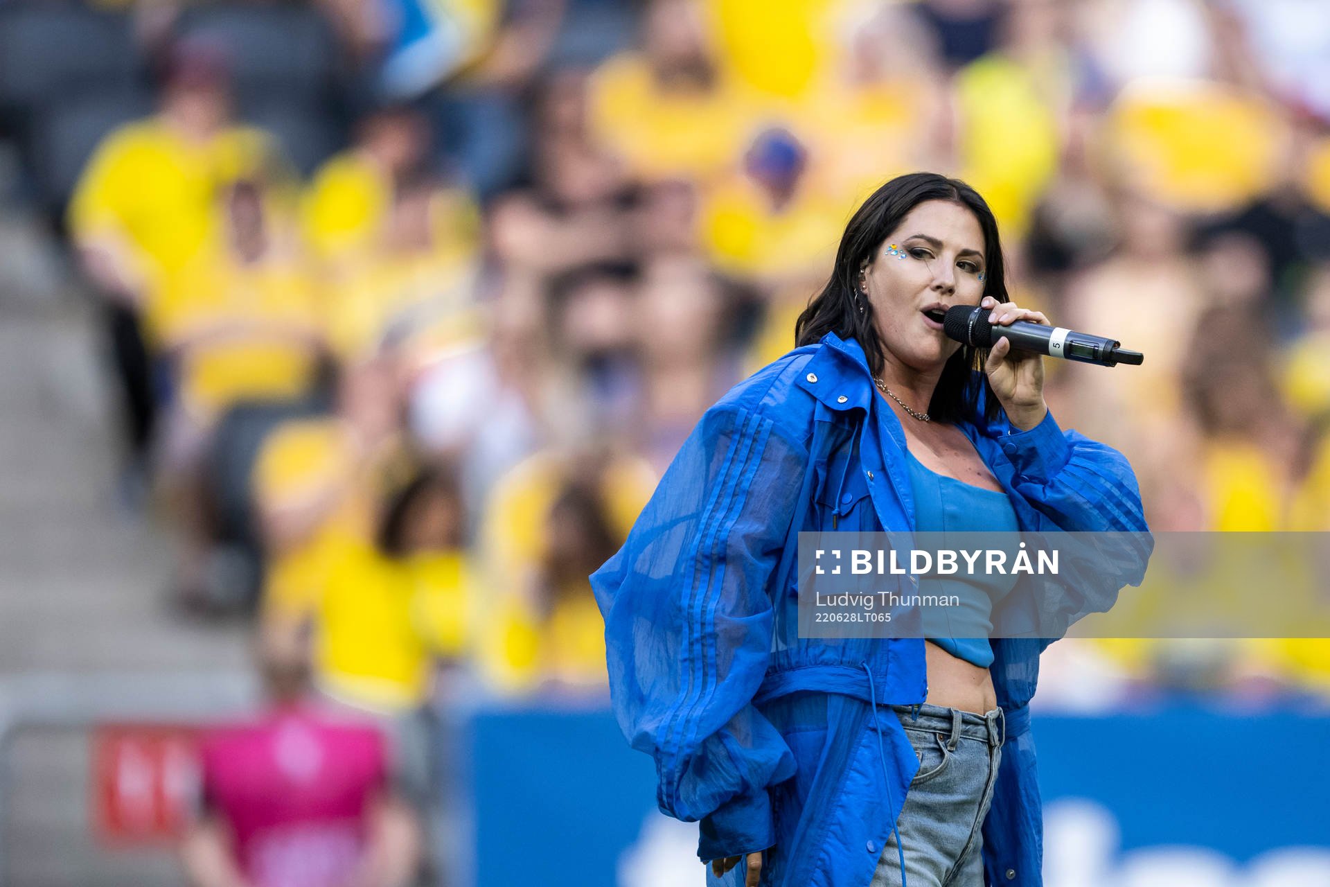 Artist Molly Sandén perform ahead of the women's international friendly football match between Sweden and Brazil on June 28, 2022 in Stockholm.