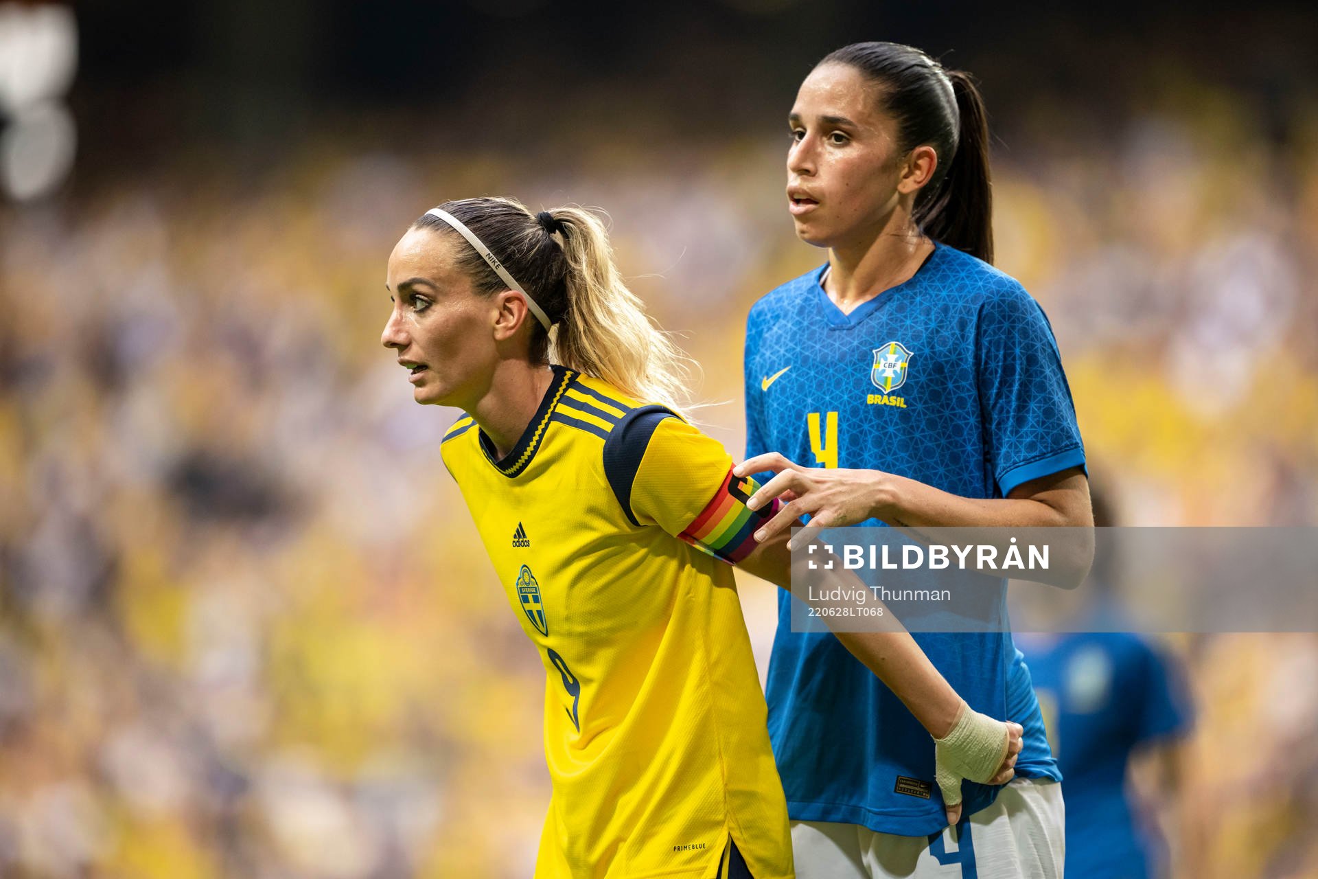 Kosovare Asllani of Sweden and Rafaelle of Brazil