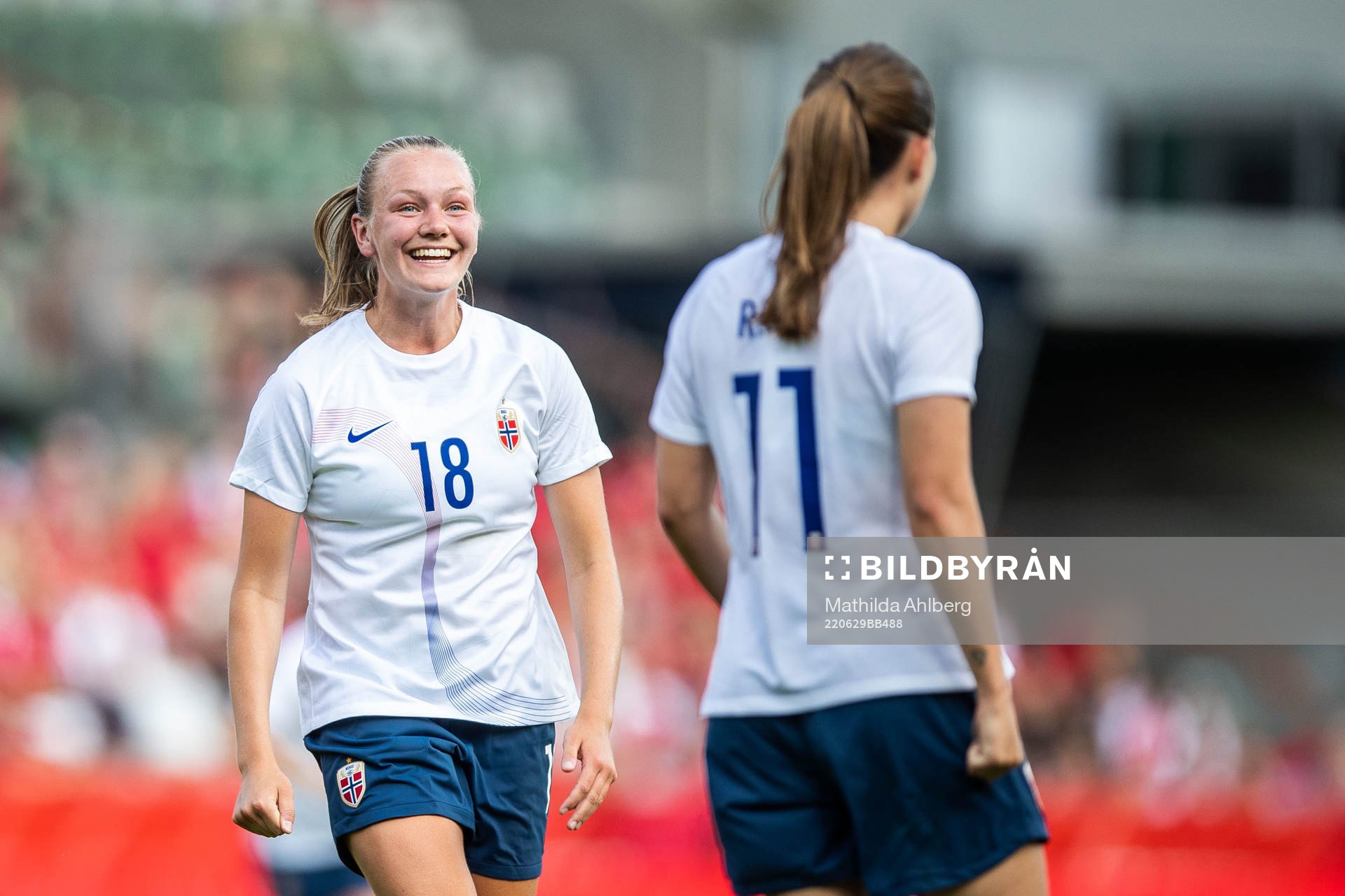 Frida Maanum of Norway celebrates 1-1 by Guro Reiten (back