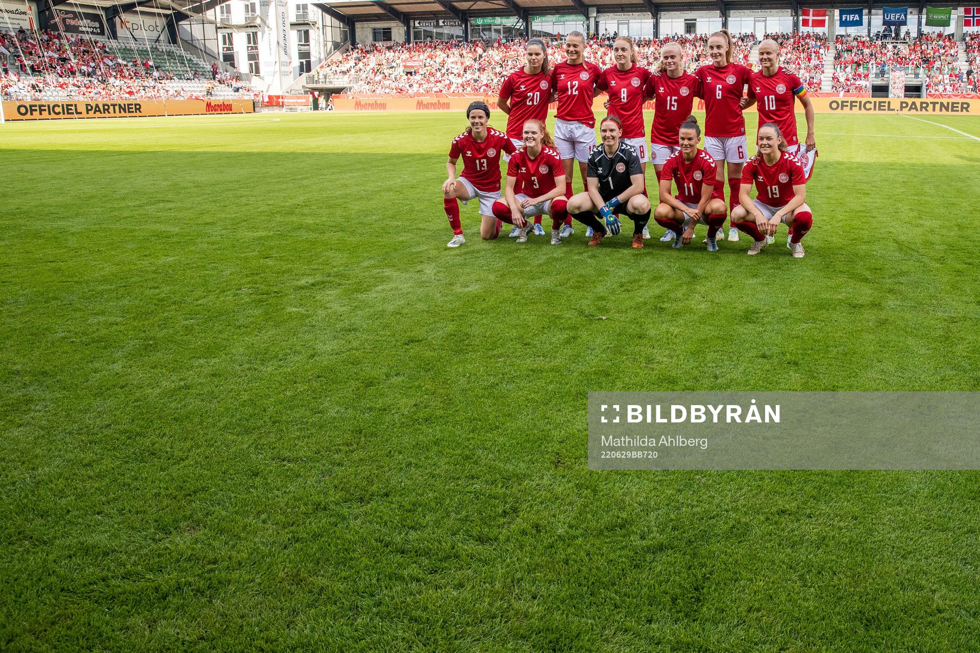 The players of Denmark pose for a photo ahead of the international friendly football match between Denmark and Norway on June 29, 2022 in Viborg. Top left: Signe Bruun, Stine Larsen, Sara Holmgaard, Kathrine Kuhl, Karen Holmgaard, Pernille Harder, Sofie Junge, Stine Ballisager, goalkeeper Lene Christensen, Katrine Veje and Janni Thomsen.