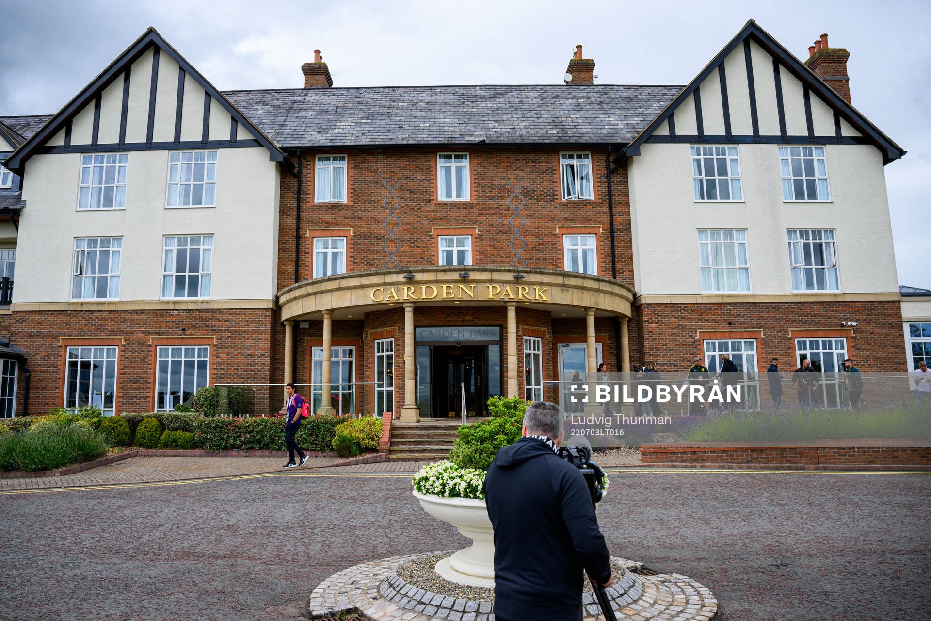 A photographer films an exterior shot of the Swedish women's national football team base camp Carden Park hotel ahead of the UEFA Women's Euro 2022 on July 3, 2022 in Chester.