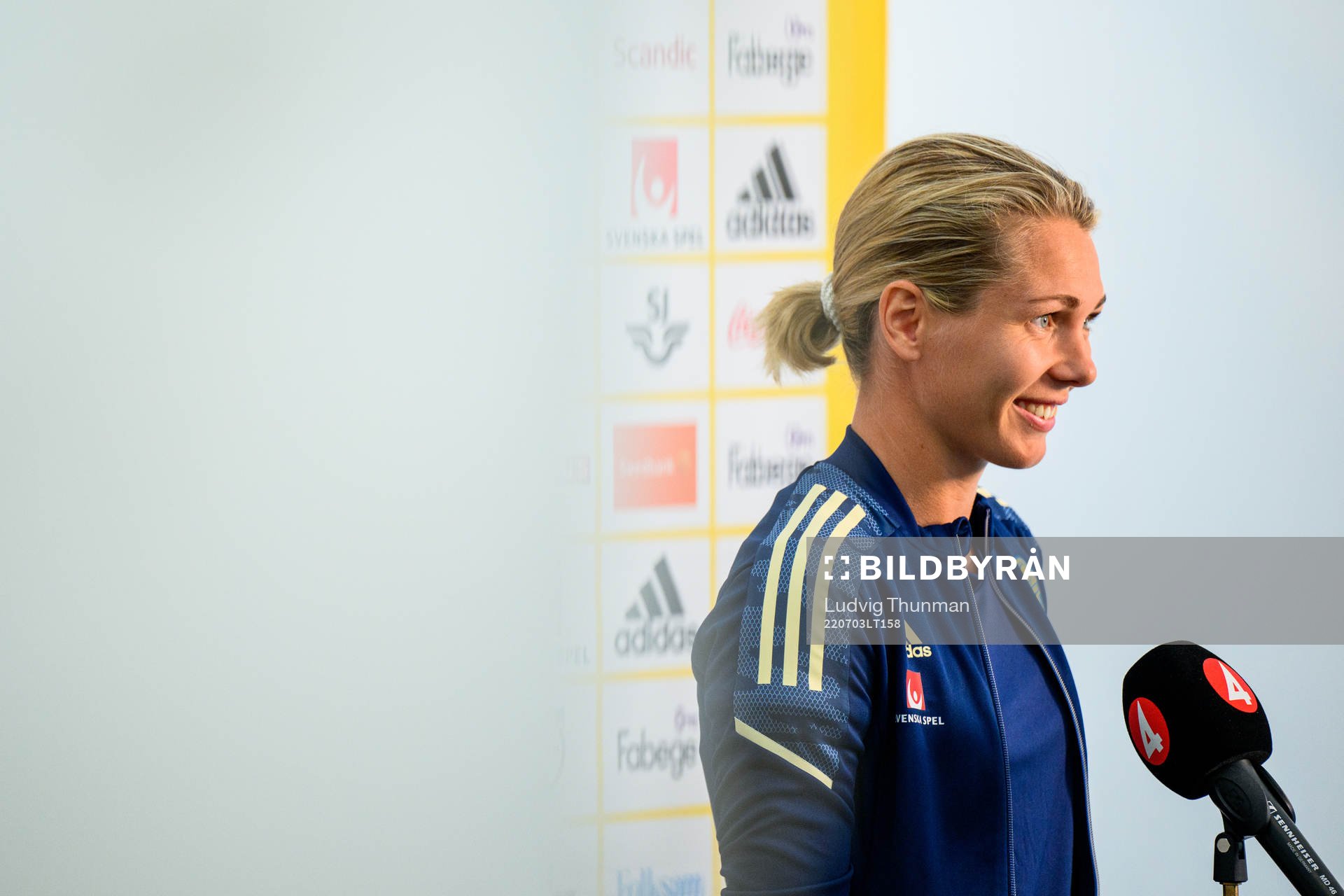 Goalkeeper Jennifer Falk is interviewed by the media