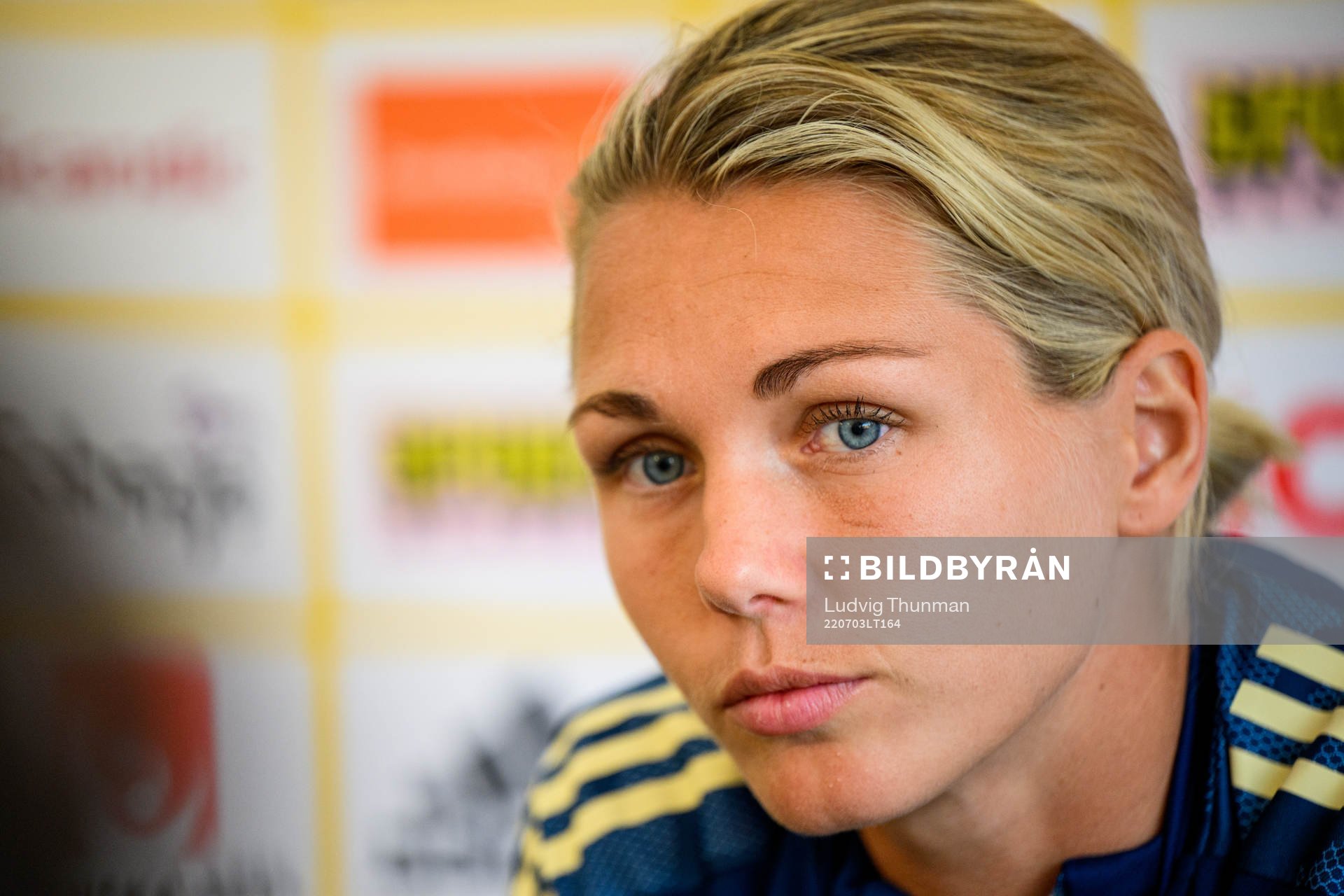 Goalkeeper Jennifer Falk is interviewed by the media