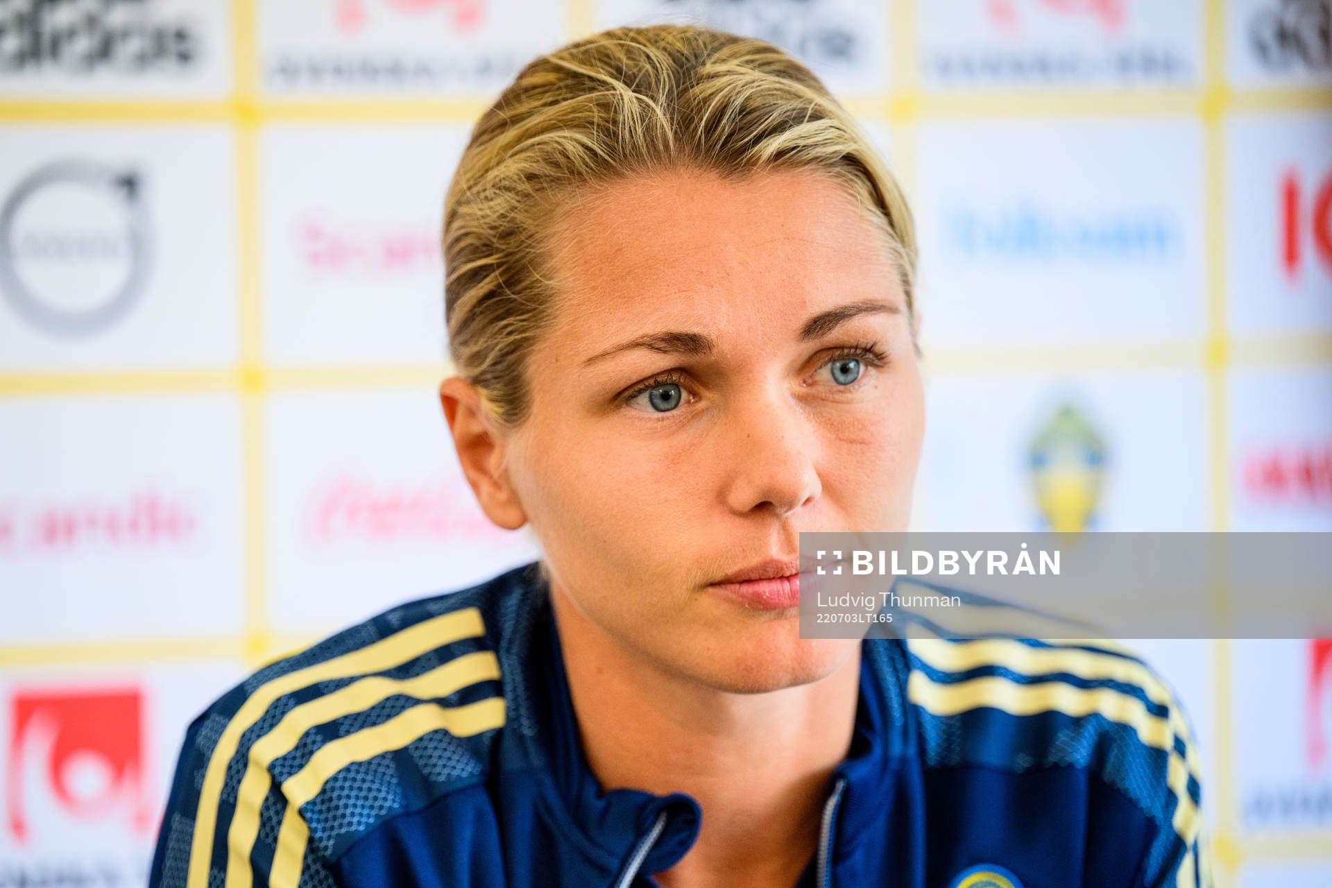Goalkeeper Jennifer Falk is interviewed by the media