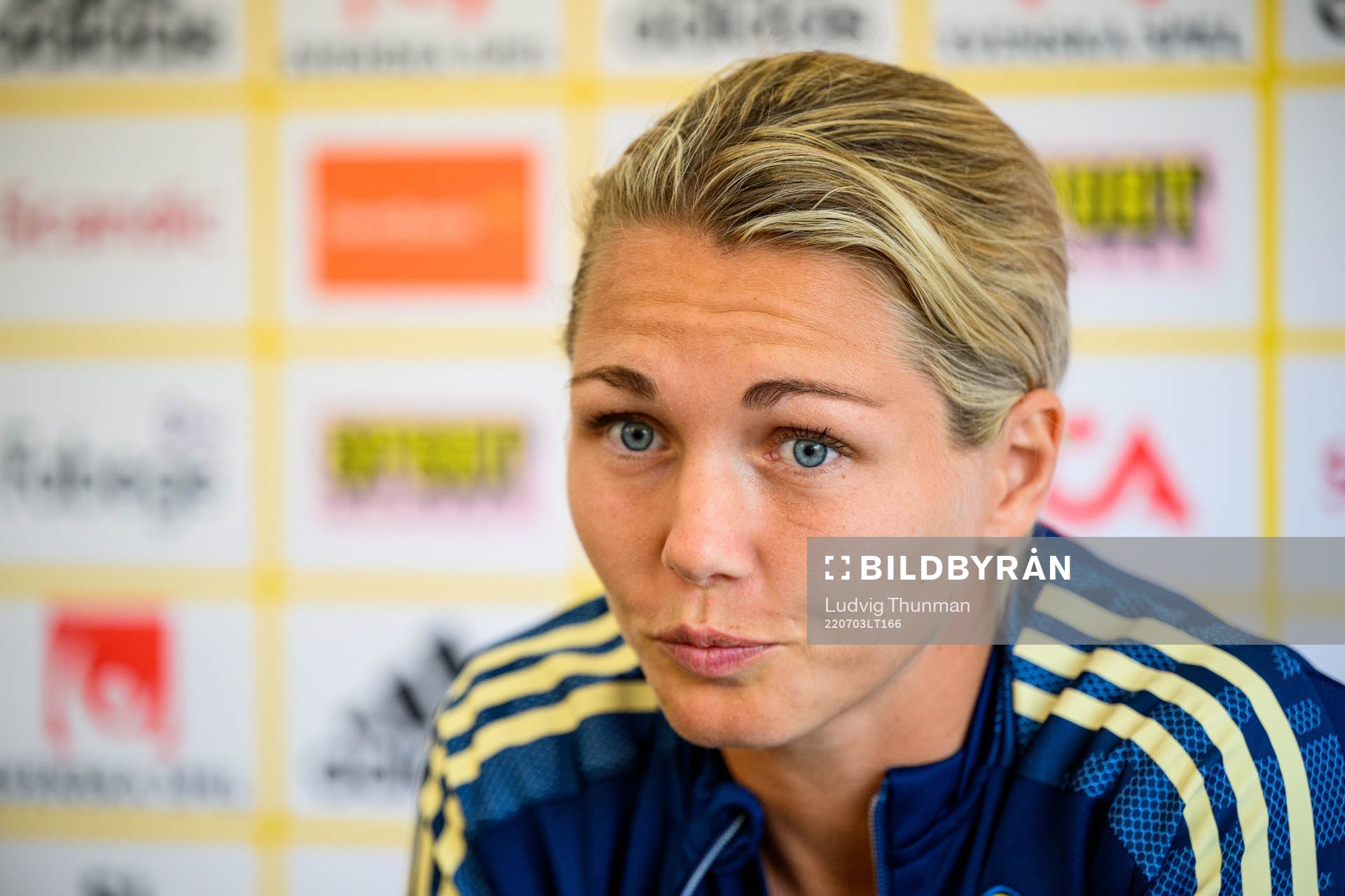 Goalkeeper Jennifer Falk is interviewed by the media