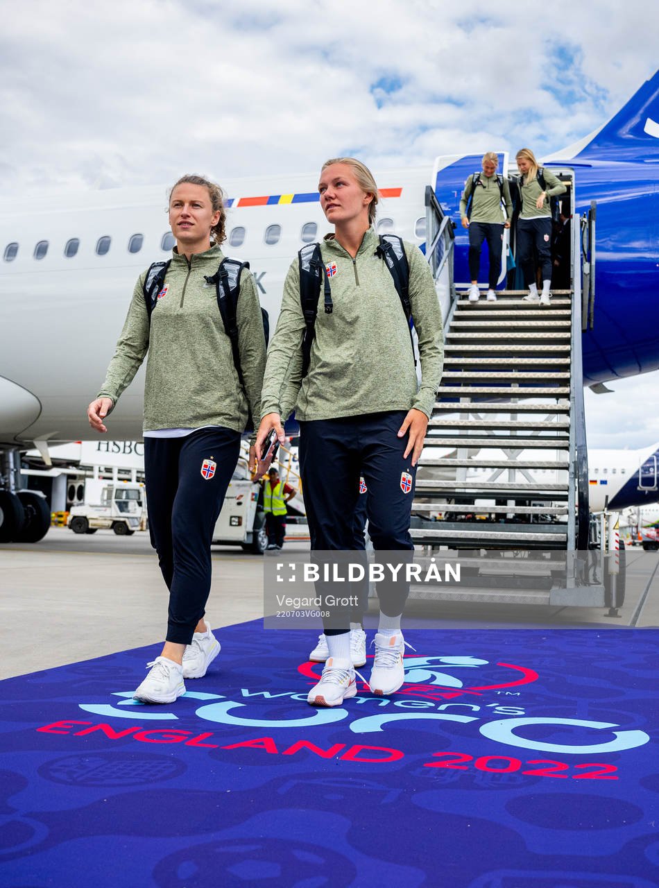 Synne Skinnes Hansen and Frida Maanum of the Norwegian women’s national football team arrive at Heathrow Airport ahead of the UEFA Women's Euro on July 3, 2022 in London.