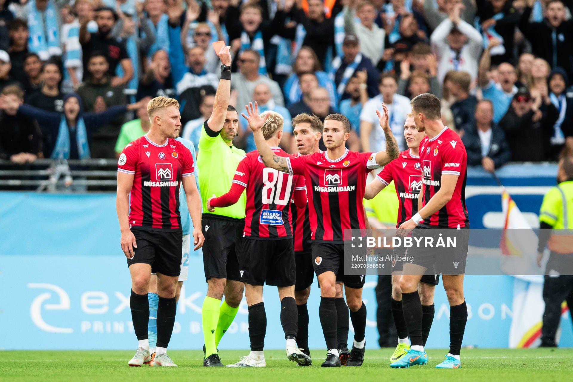 Kristall Mani Ingason of Vikingur receives a red card from