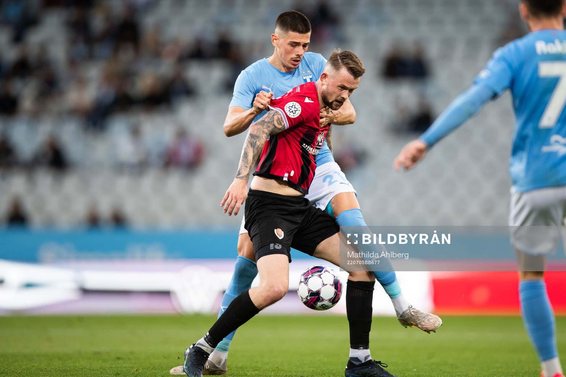 Dennis Hadzikadunic of Malmö FF and Nikolaj Hansen of Vikingur during the UEFA Champions League qualifying match between Malmö FF and Vikingur on July 5, 2022 in Malmö.