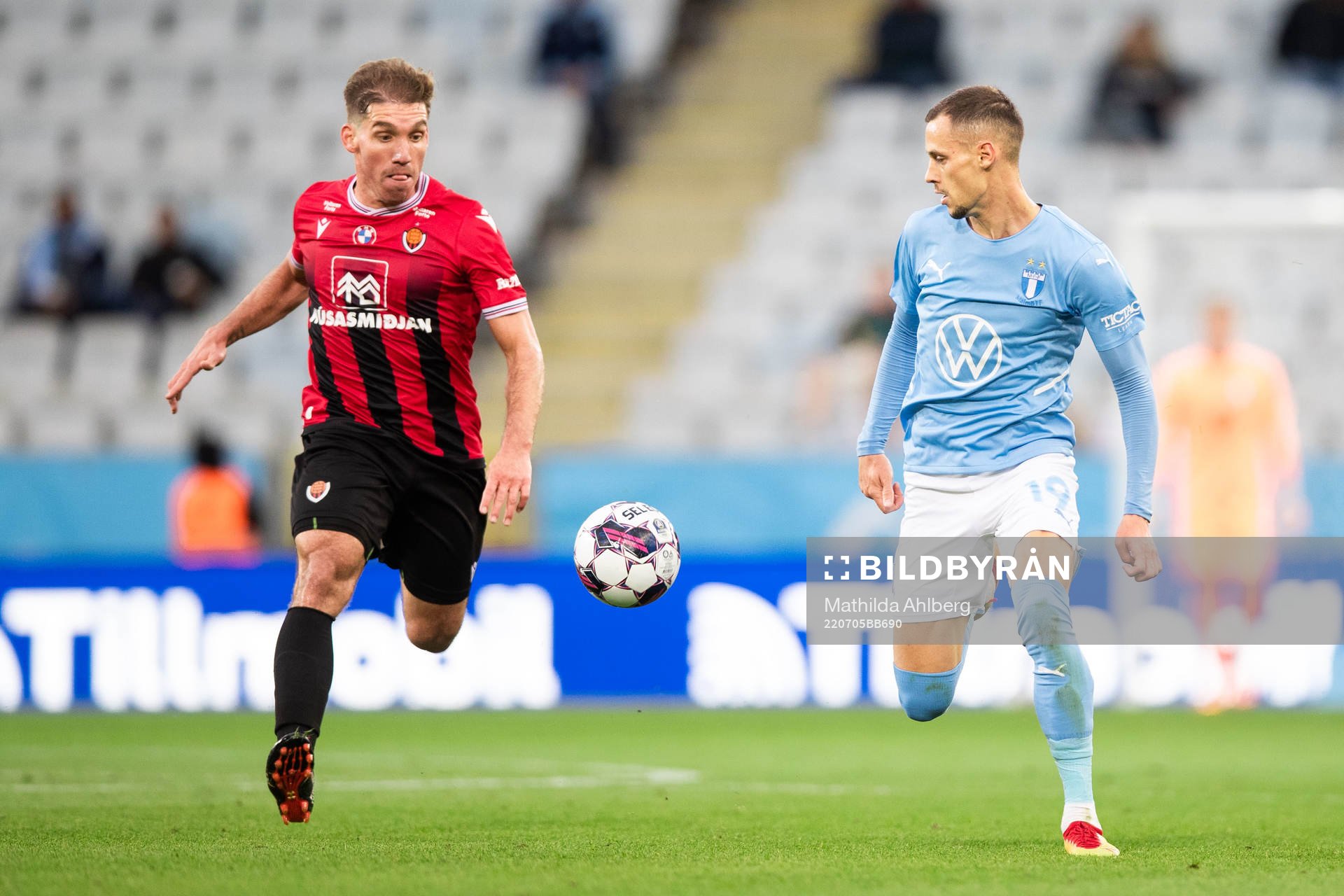 Pablo Punyed of Vikingur and Veljko Birmancevic of Malmö FF during the UEFA Champions League qualifying match between Malmö FF and Vikingur on July 5, 2022 in Malmö.