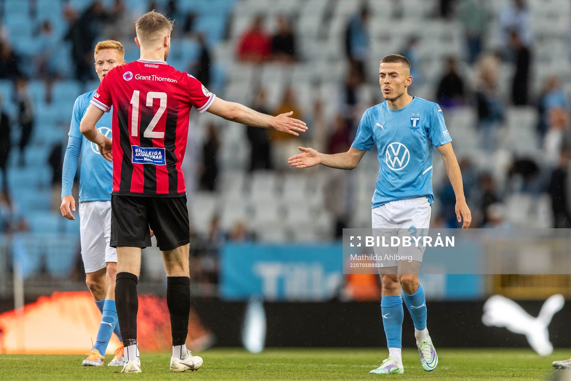 Halldor Smari Sigurdsson of Vikingur and Patriot Sejdiu of