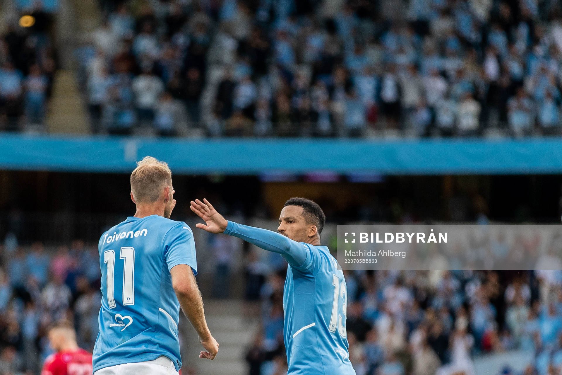 Ola Toivonen and Martin Olsson of Malmö FF celebrate 2-1