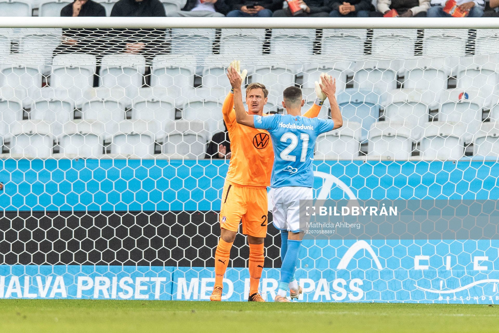 Goalkeeper Johan Dahlin and Dennis Hadzikadunic of Malmö FF