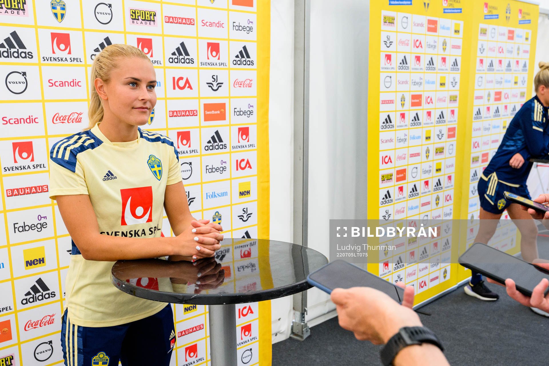 Amanda Nilden is interviewed by the media