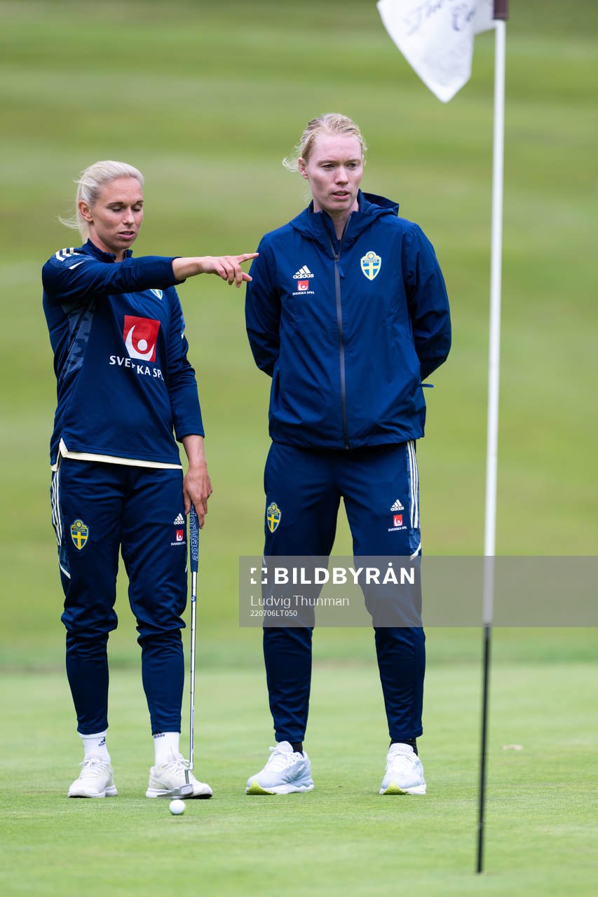 Jonna Andersson and goalkeeper Hedvig Lindahl of Sweden