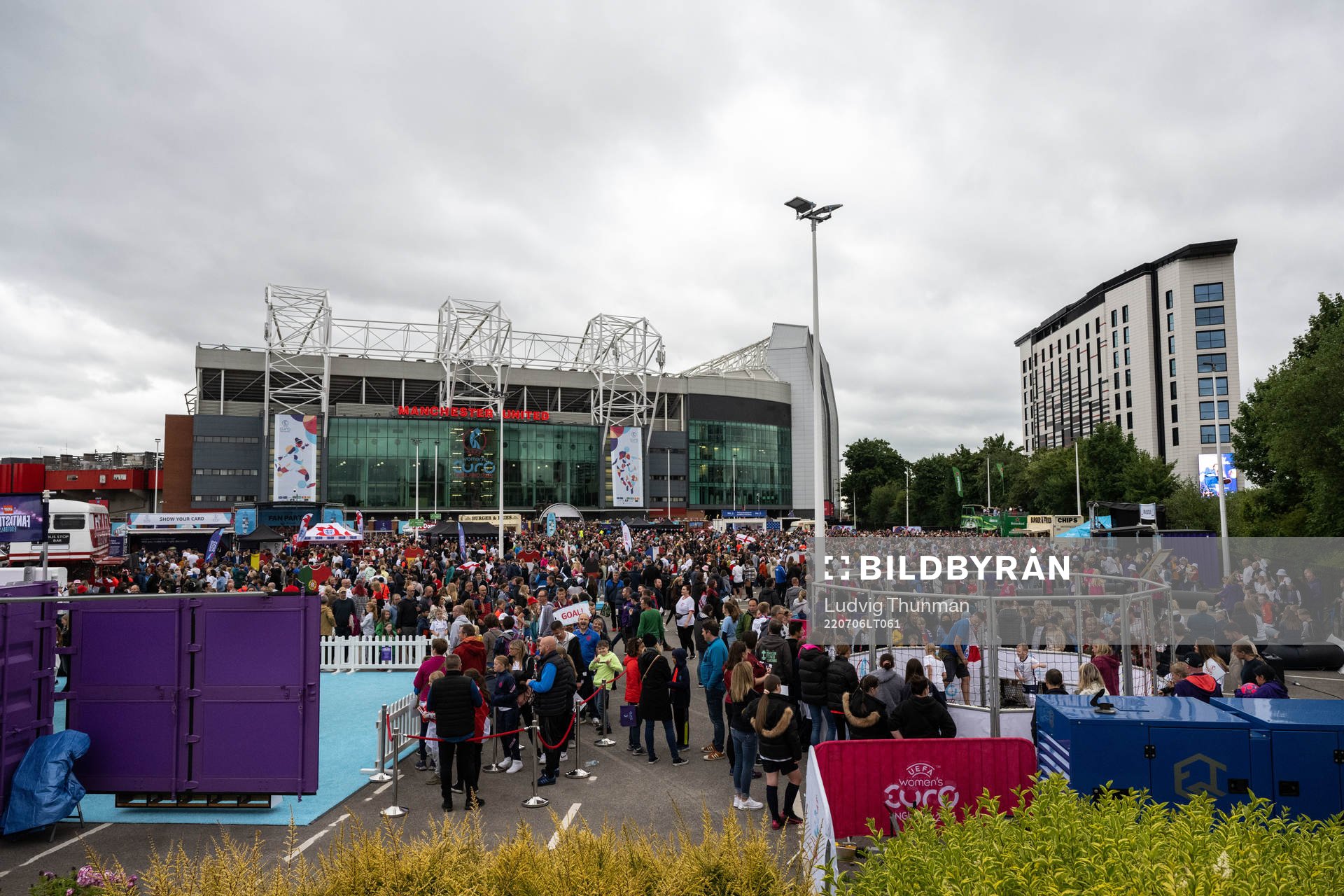 Spectators outside Old Trafford ahead of the UEFA Women's Euro 2022 group stage match between England and Austria on July 6, 2022 in Manchester. 