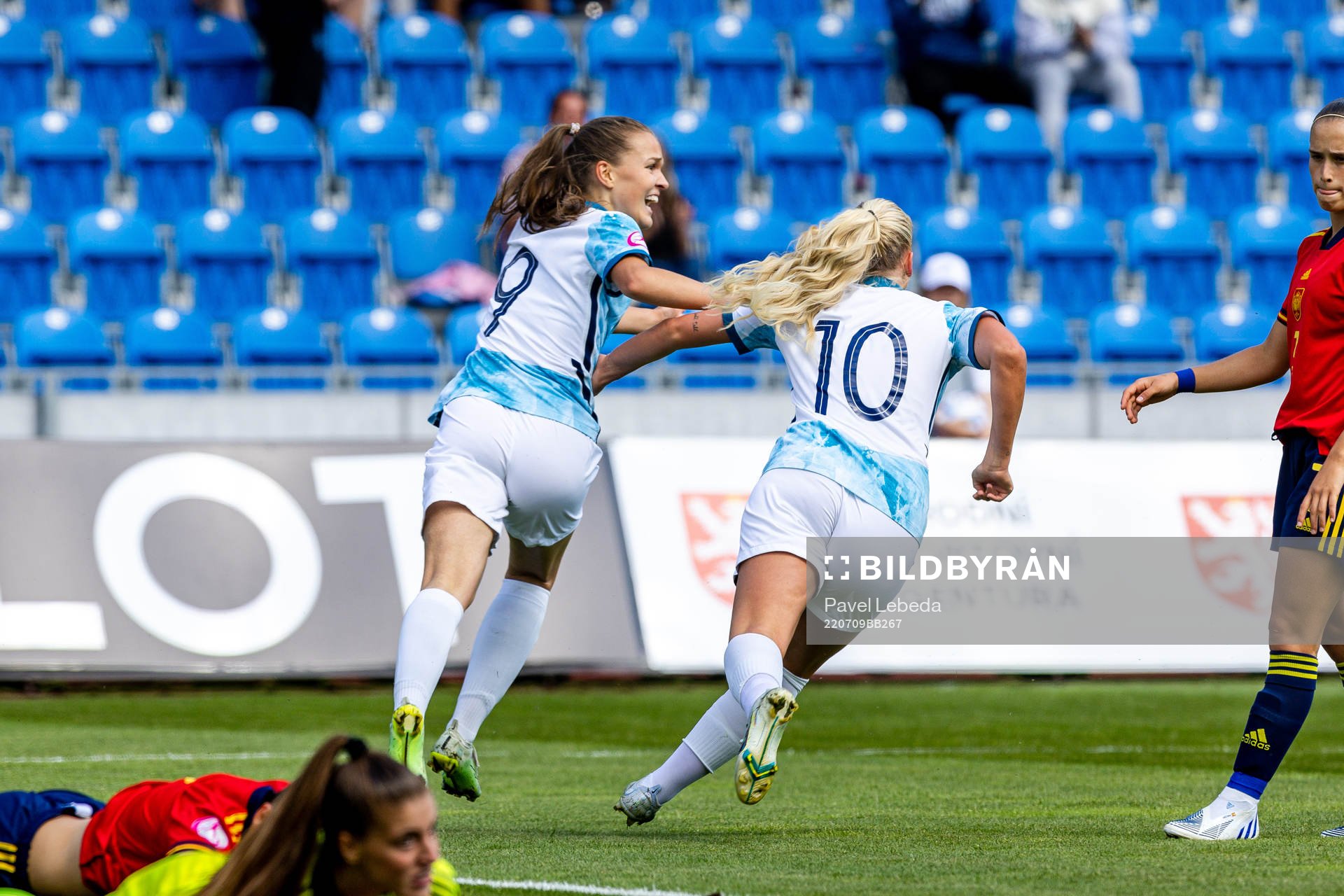 Iris Omarsdottir and Cathinka Tandberg of Norway celebrate