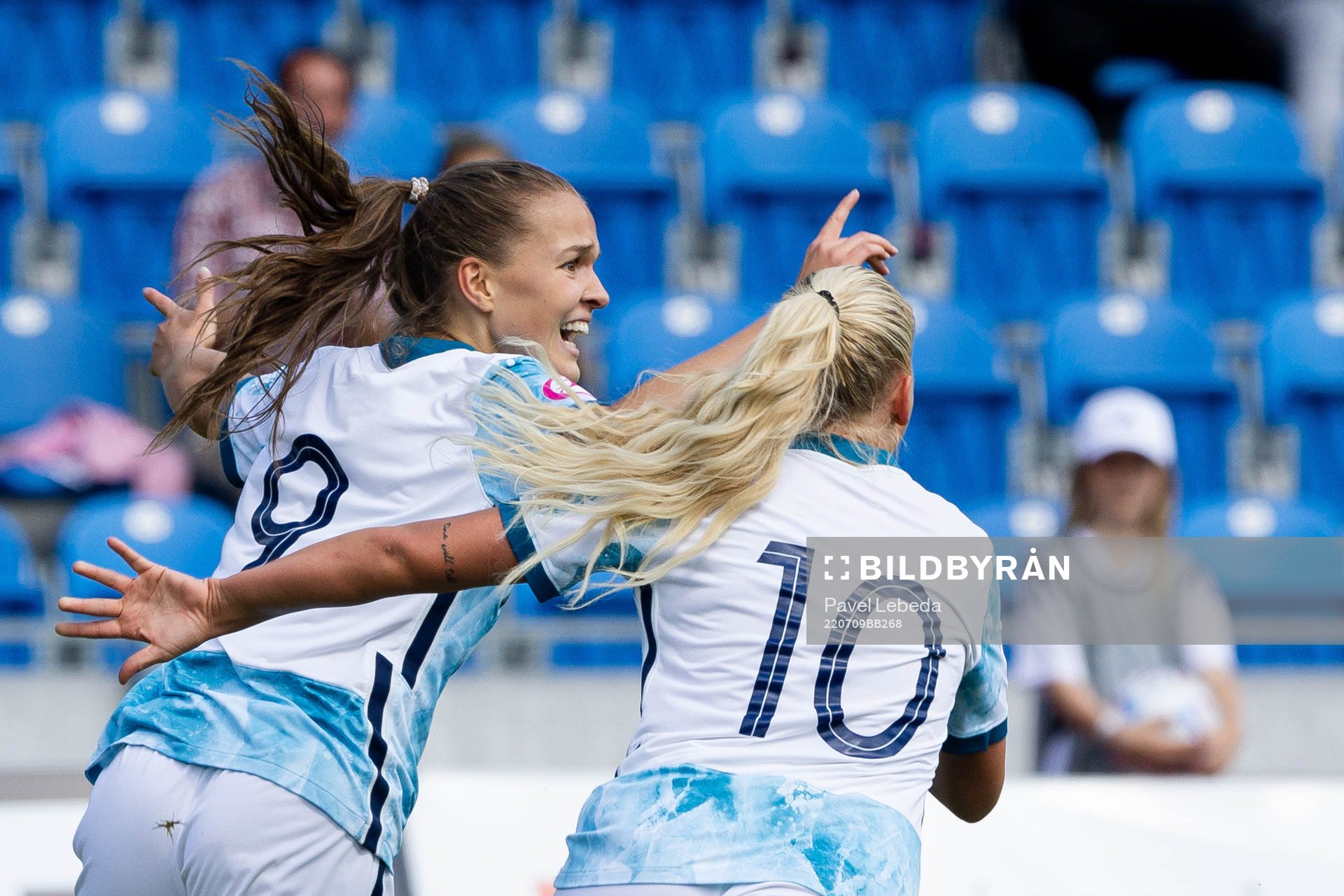 Iris Omarsdottir and Cathinka Tandberg of Norway celebrate