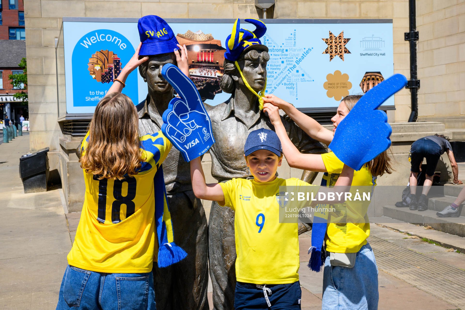 Supporters of Sweden put fan merchandise