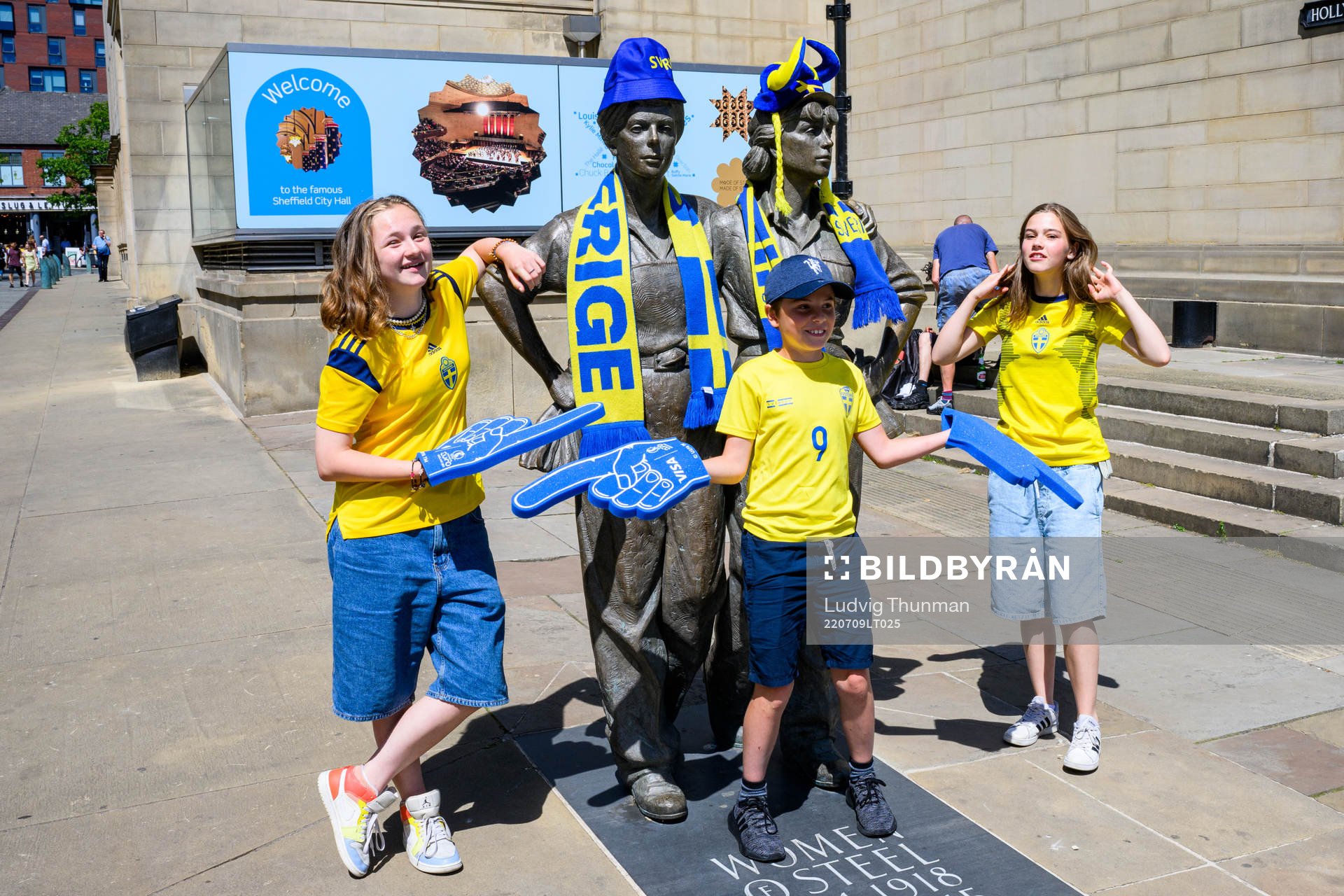 Supporters of Sweden put fan merchandise