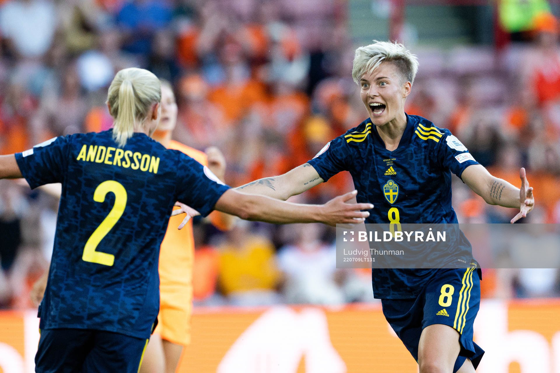 Jonna Andersson and Lina Hurtig of Sweden celebrate the 0-1