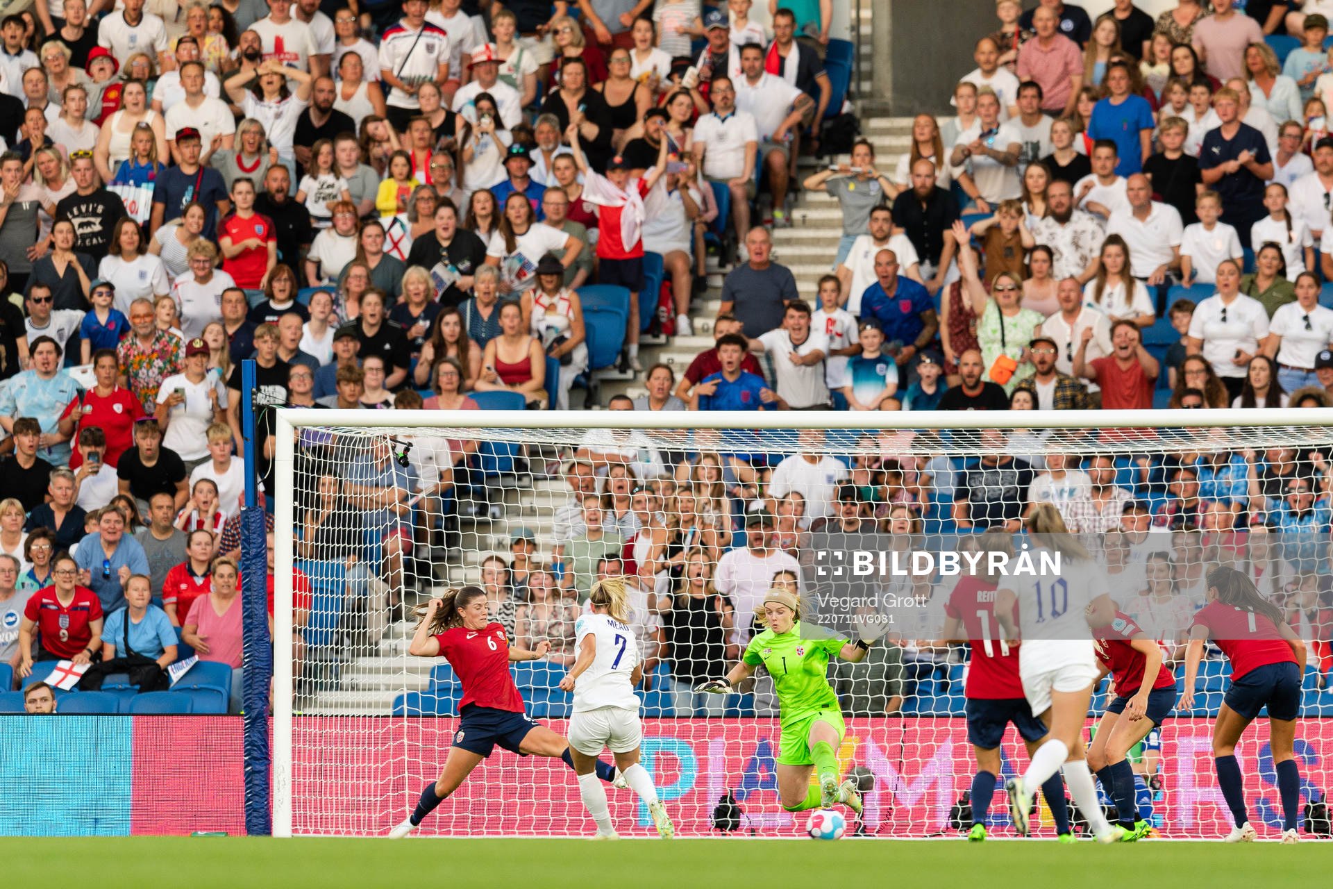 Beth Mead of England scores the 5-0 goal behind Maren