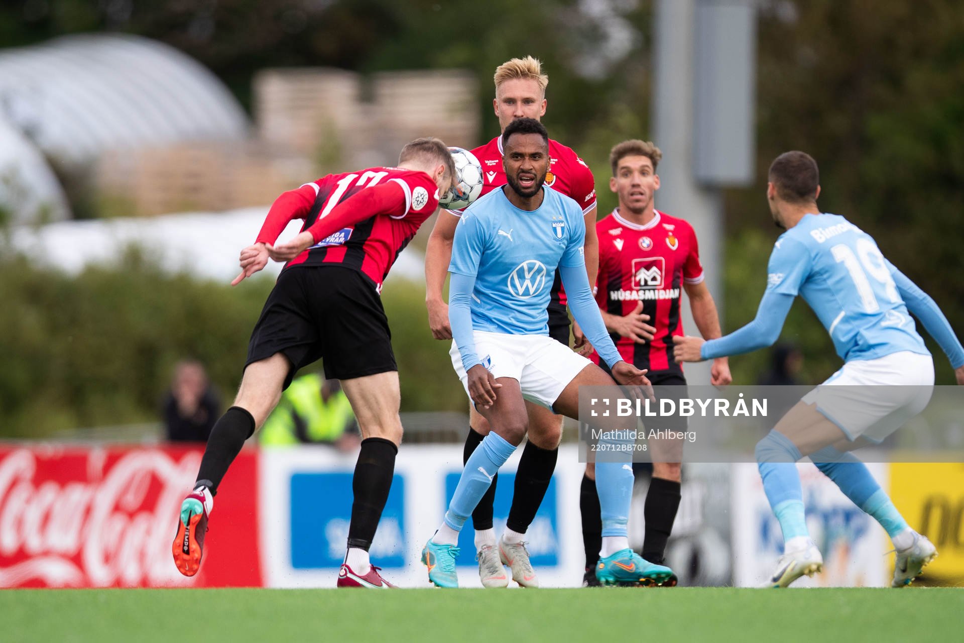 Halldor Smari Sigurdsson and Peter Oliver Ekroth of Vikingur and Isaac Kiese Thelin of Malmö FF during the UEFA Champions League qualifying match between Vikingur and Malmö FF on July 12, 2022 in Reykjavik.