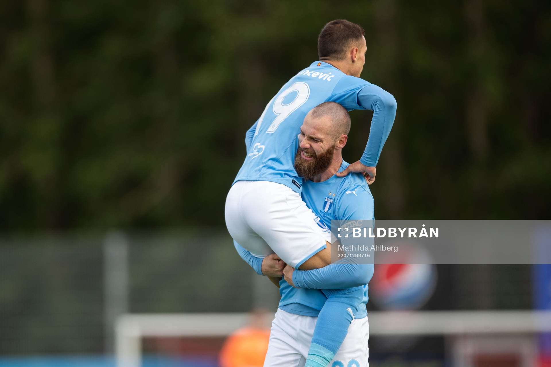 Veljko Birmancevic and Jo Inge Berget of Malmö FF celebrate