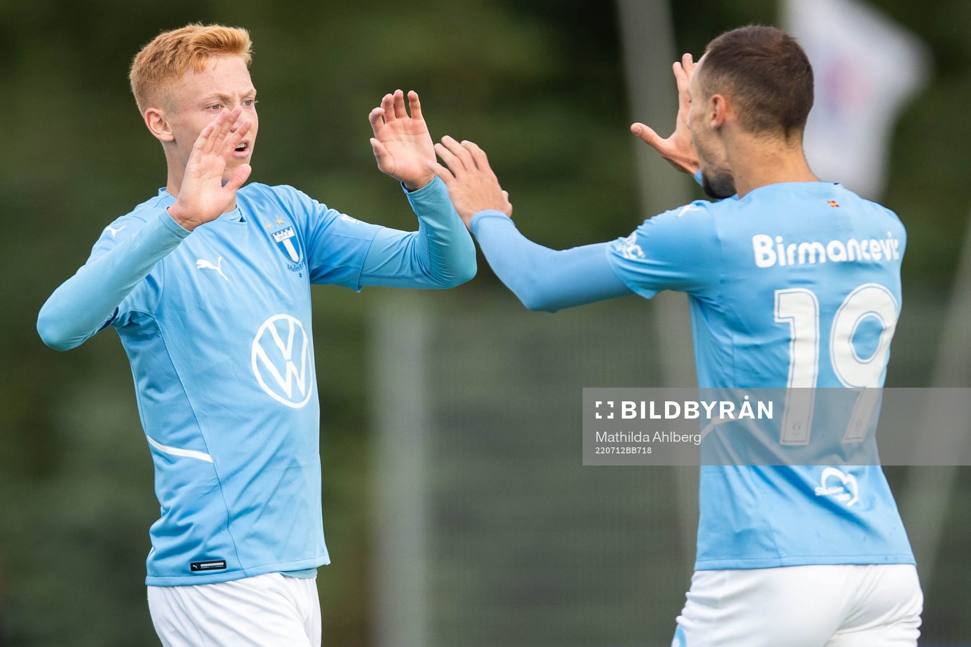 Hugo Larsson and Veljko Birmancevic of Malmö FF celebrate