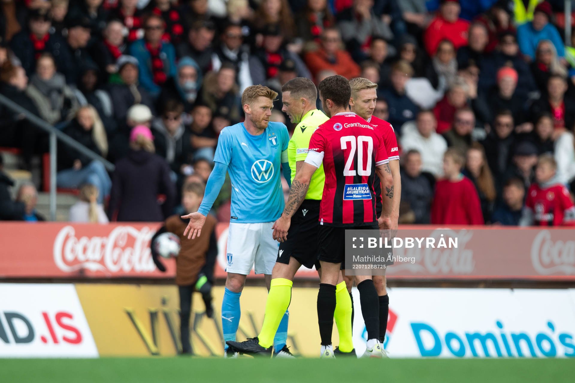 Anders Christiansen of Malmö FF talks to referee John
