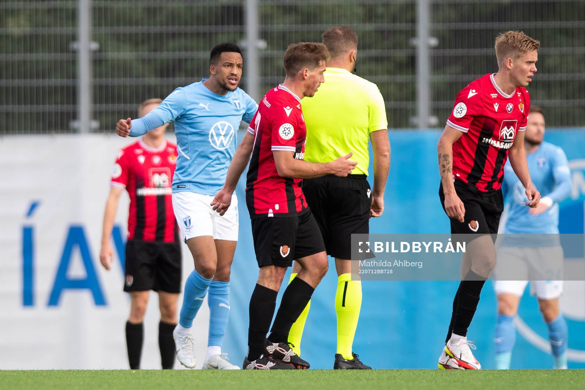 Martin Olsson of Malmö FF reacts to referee John Beaton