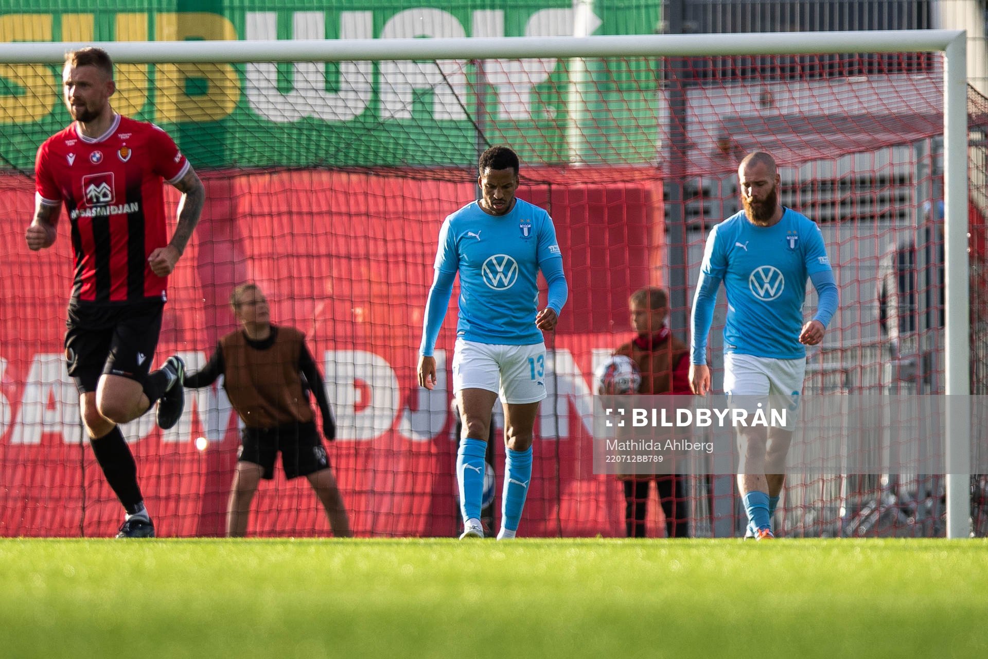 Martin Olsson and Jo Inge Berget of Malmö FF looks dejected