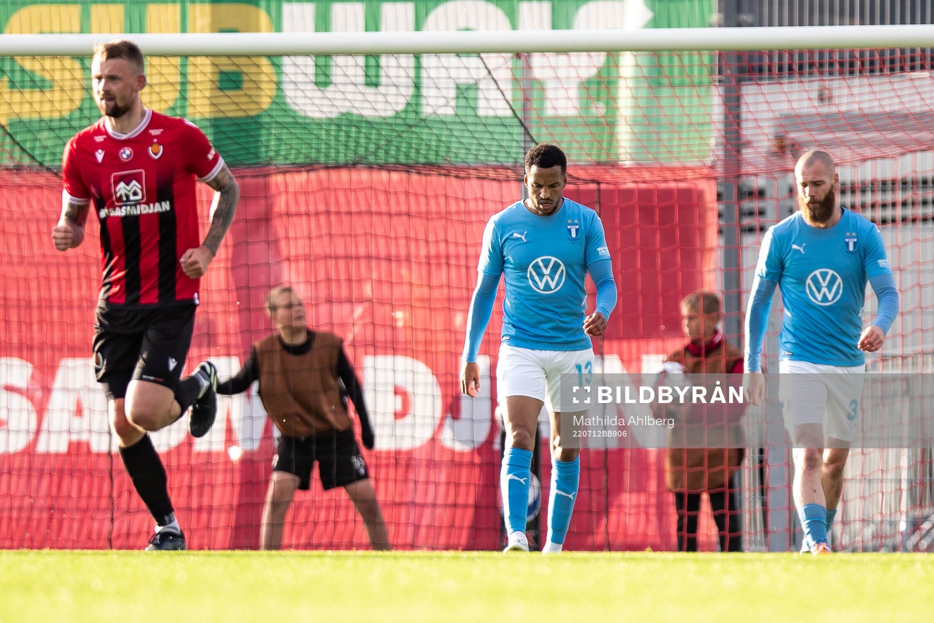 Martin Olsson and Jo Inge Berget of Malmö FF looks dejected