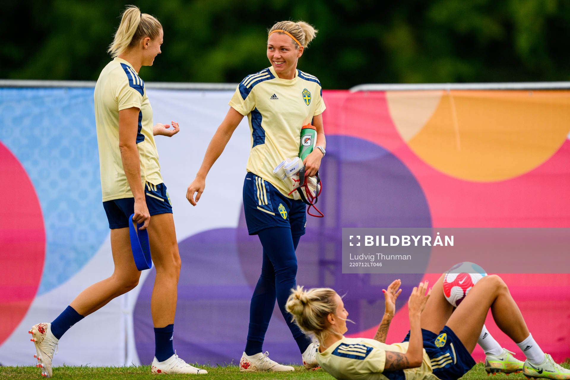 Fridolina Rolfö and goalkeeper Jennifer Falk of the