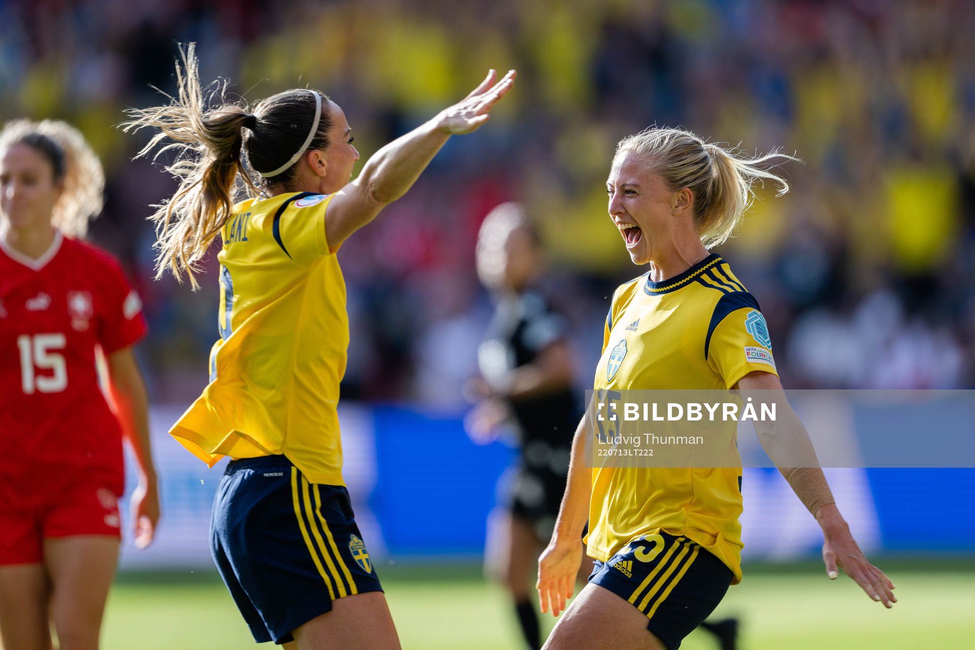 Kosovare Asllani and Rebecka Blomqvist of Sweden celebrate