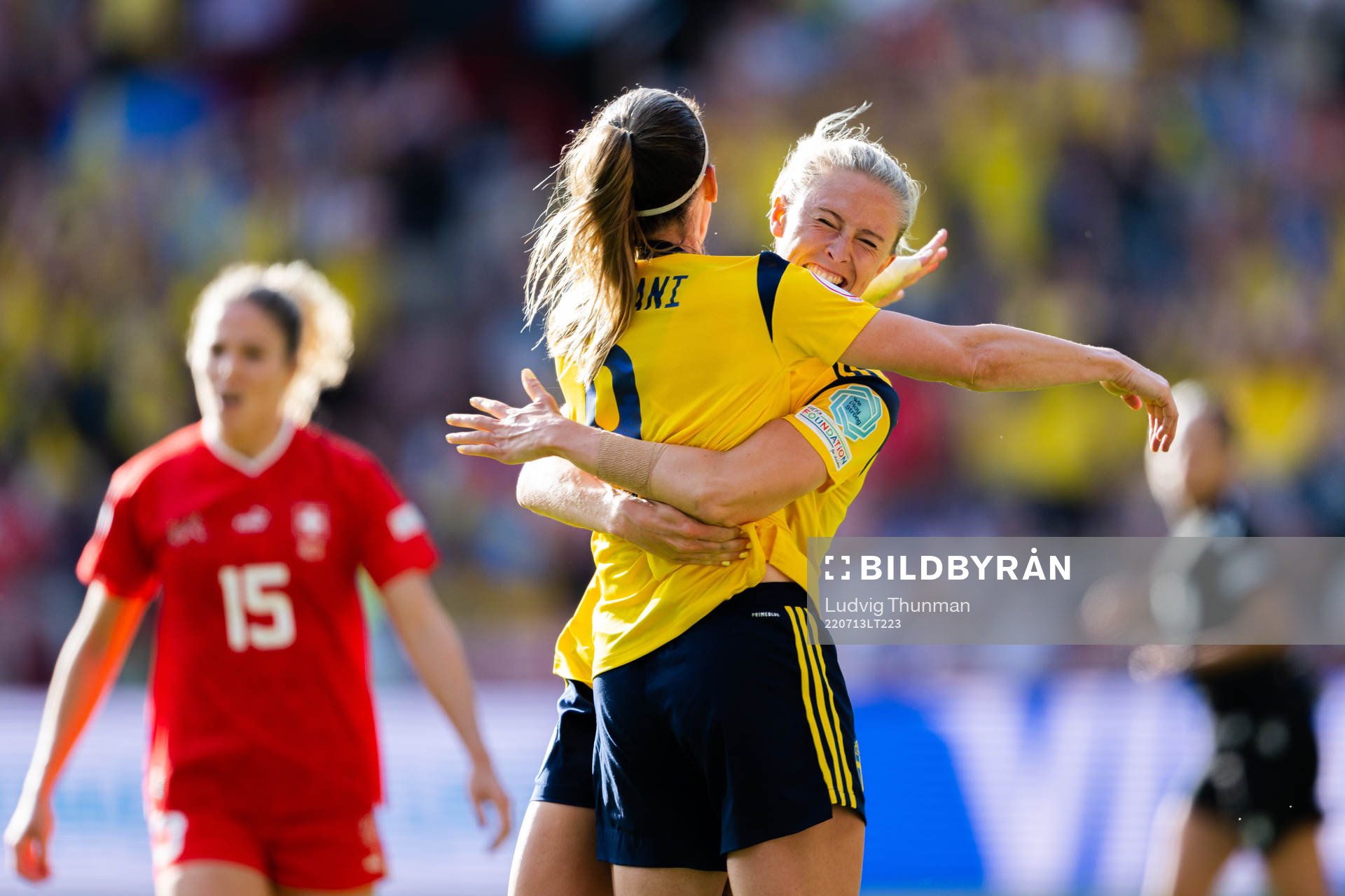 Kosovare Asllani and Rebecka Blomqvist of Sweden celebrate