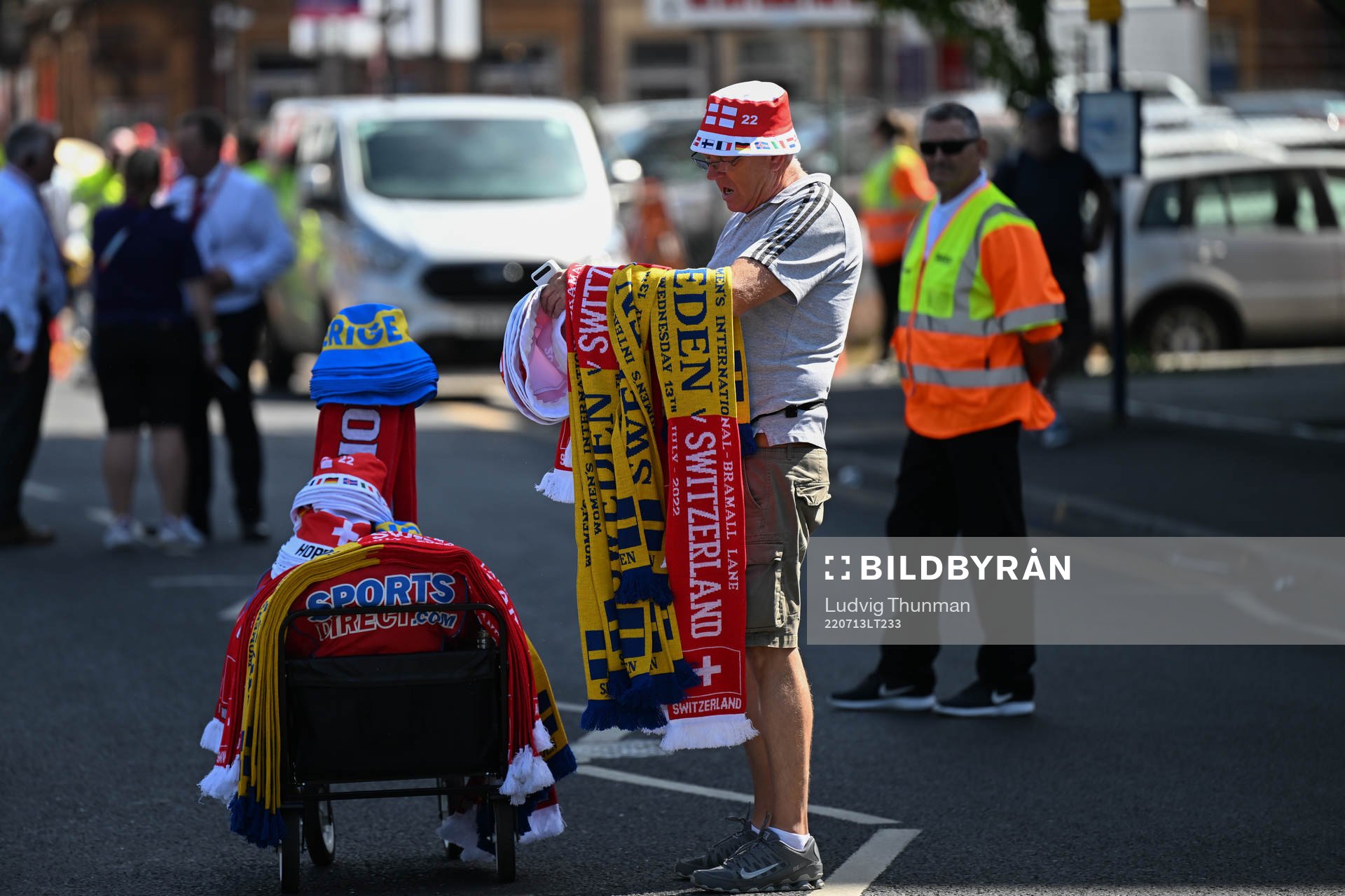A vender selling scarves